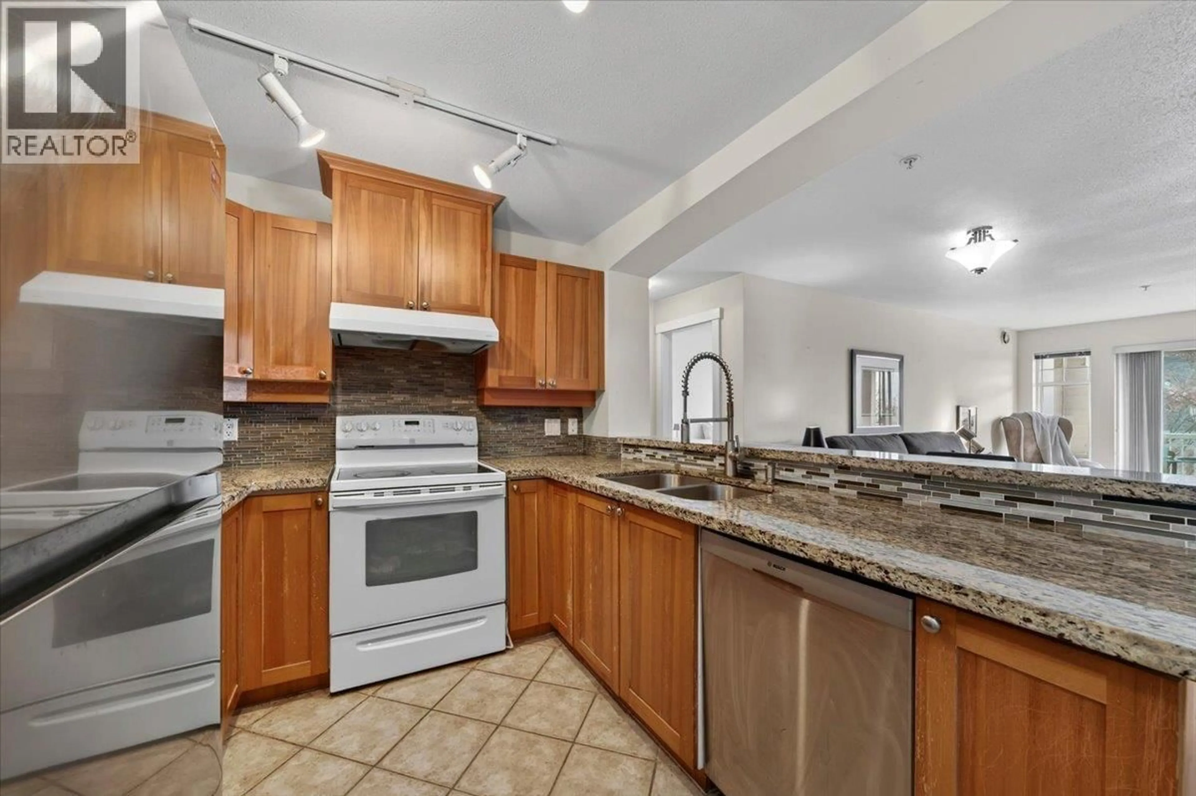 Open concept kitchen, ceramic/tile floor for 212 - 1428 PARKWAY BOULEVARD, Coquitlam British Columbia V3E3L8