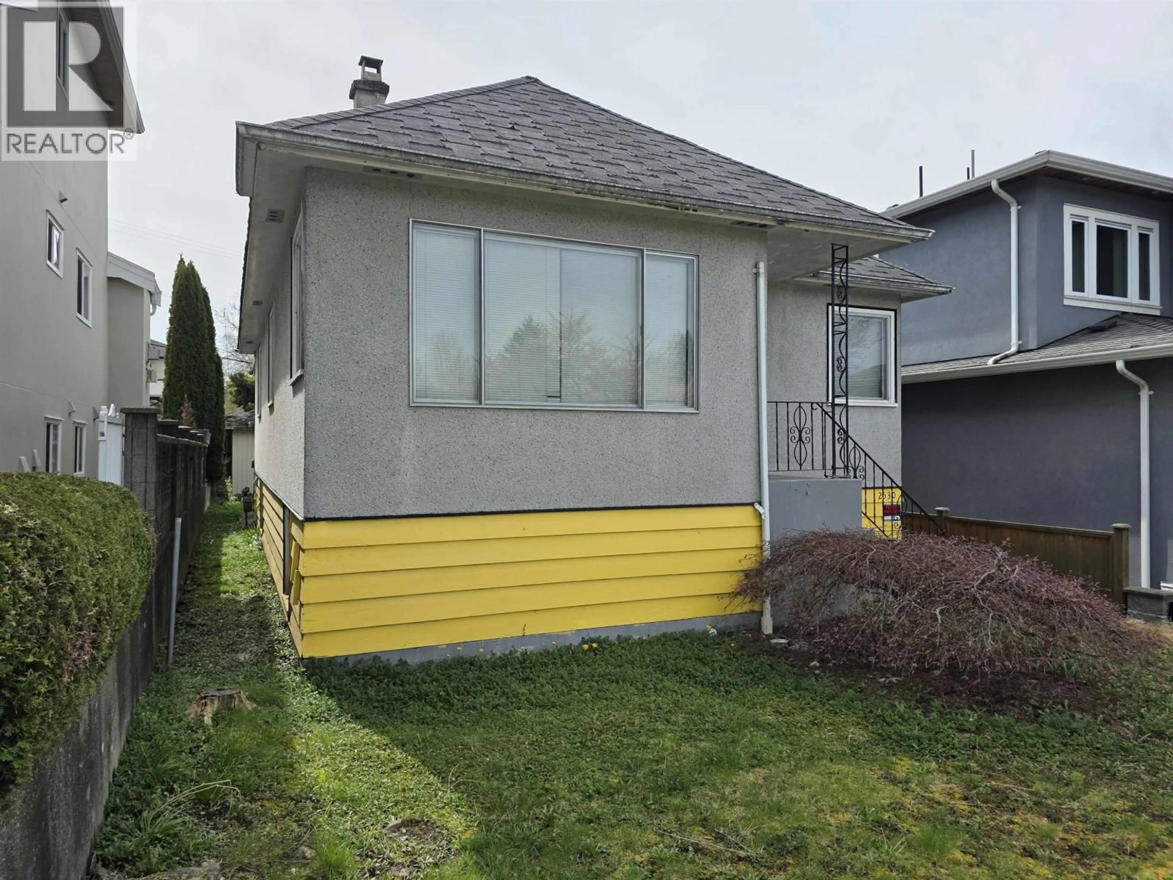 Home with vinyl exterior material, street for 2530 7TH AVENUE, Vancouver British Columbia V5M1T4