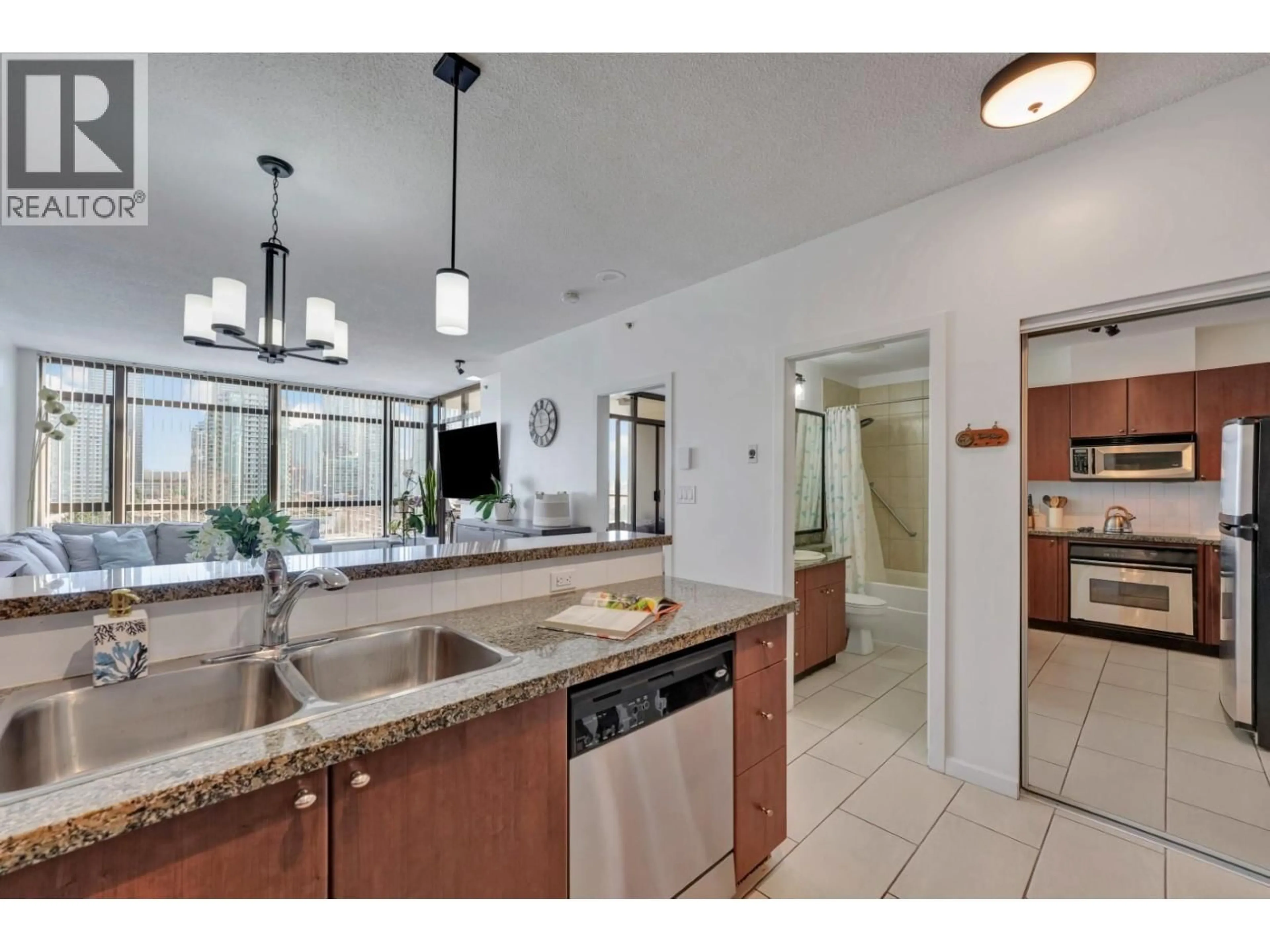 Open concept kitchen, ceramic/tile floor for 1105 - 4132 HALIFAX STREET, Burnaby British Columbia V5C6V1