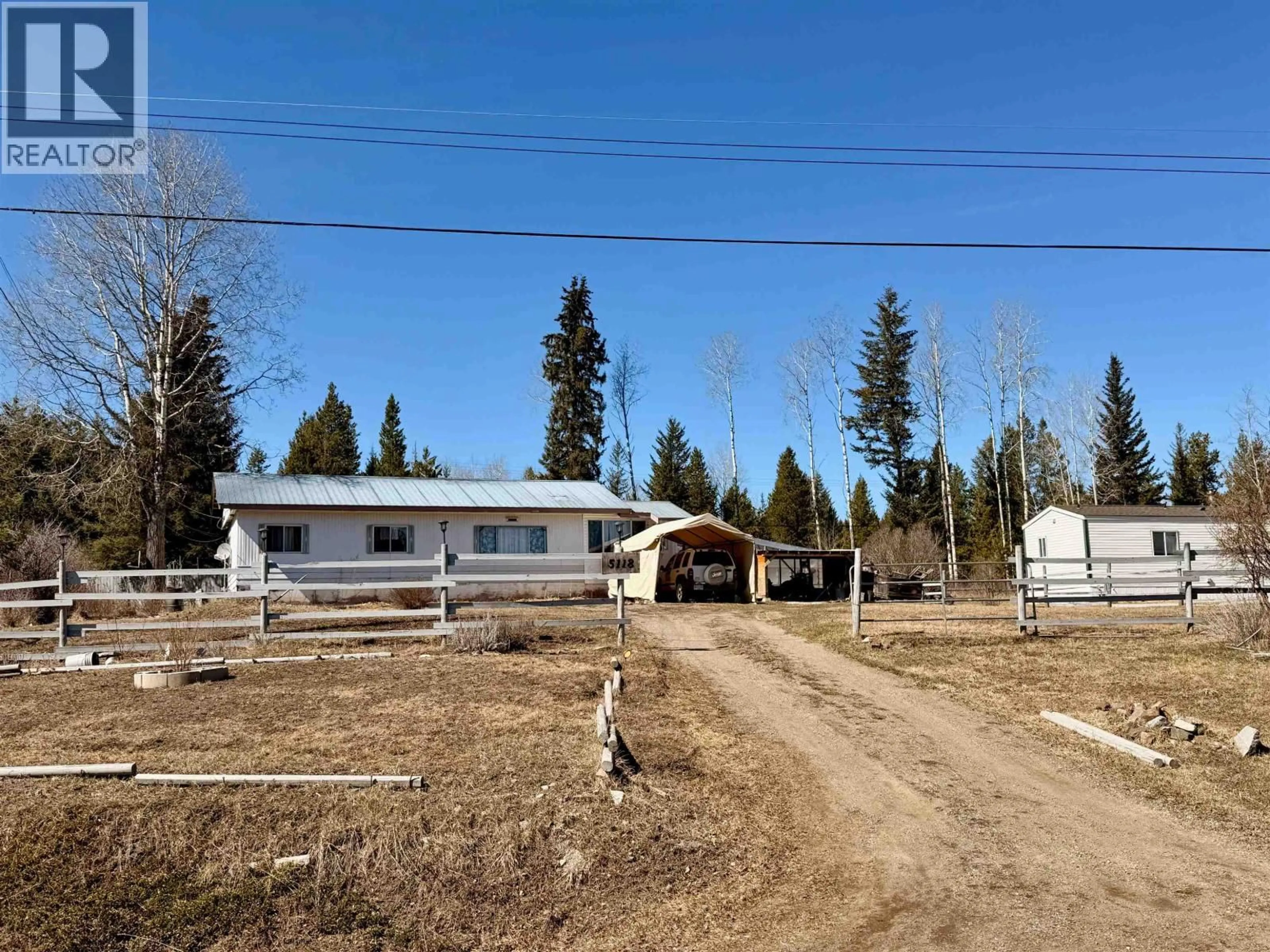 A pic from outside/outdoor area/front of a property/back of a property/a pic from drone, unknown for 5118 PERKINS ROAD, 100 Mile House British Columbia V0K1G0