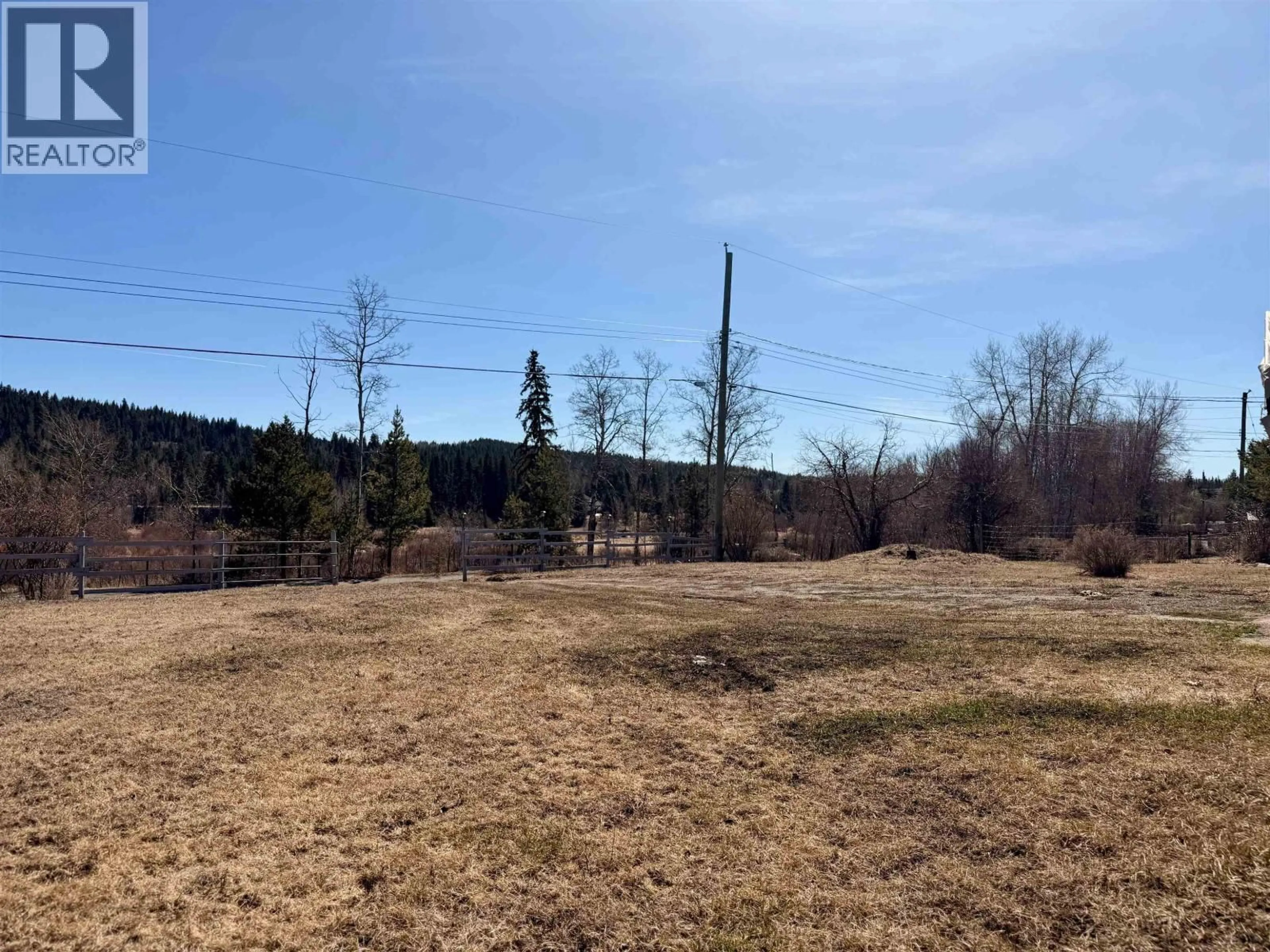 A pic from outside/outdoor area/front of a property/back of a property/a pic from drone, forest/trees view for 5118 PERKINS ROAD, 100 Mile House British Columbia V0K1G0