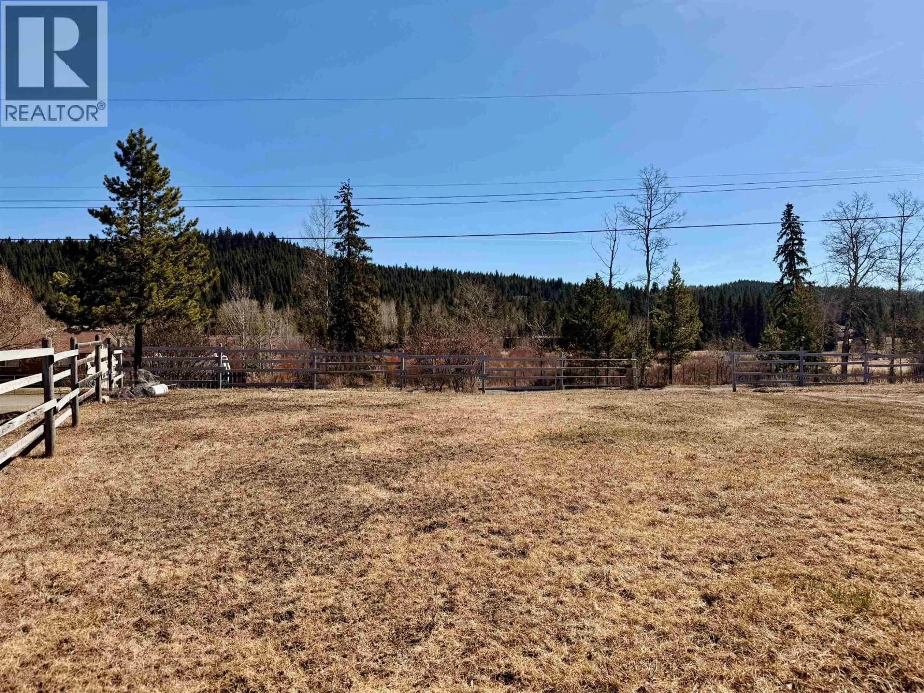 A pic from outside/outdoor area/front of a property/back of a property/a pic from drone, forest/trees view for 5118 PERKINS ROAD, 100 Mile House British Columbia V0K1G0
