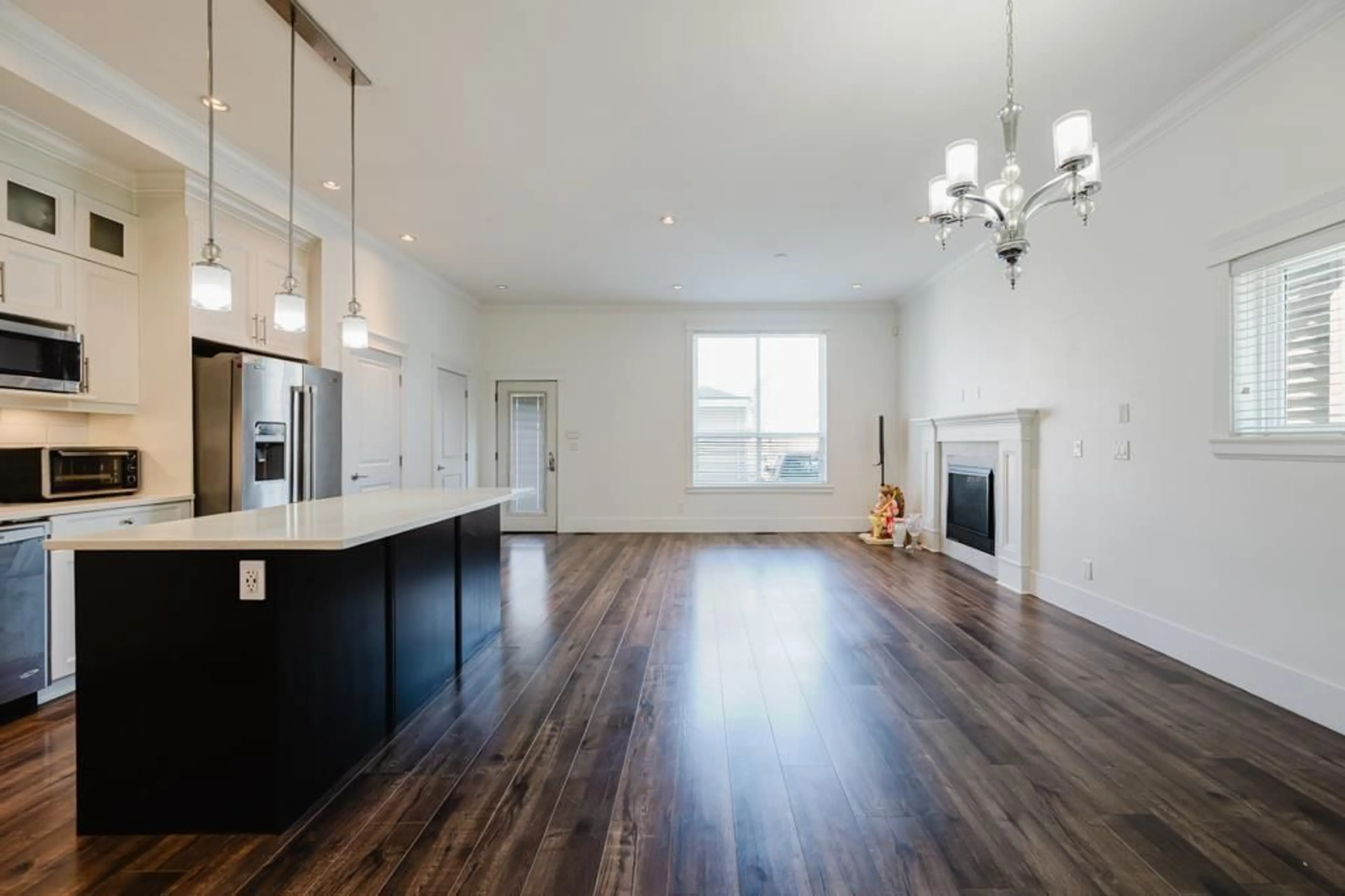 Open concept kitchen, wood/laminate floor for 19555 72 AVENUE, Surrey British Columbia V4N3E8