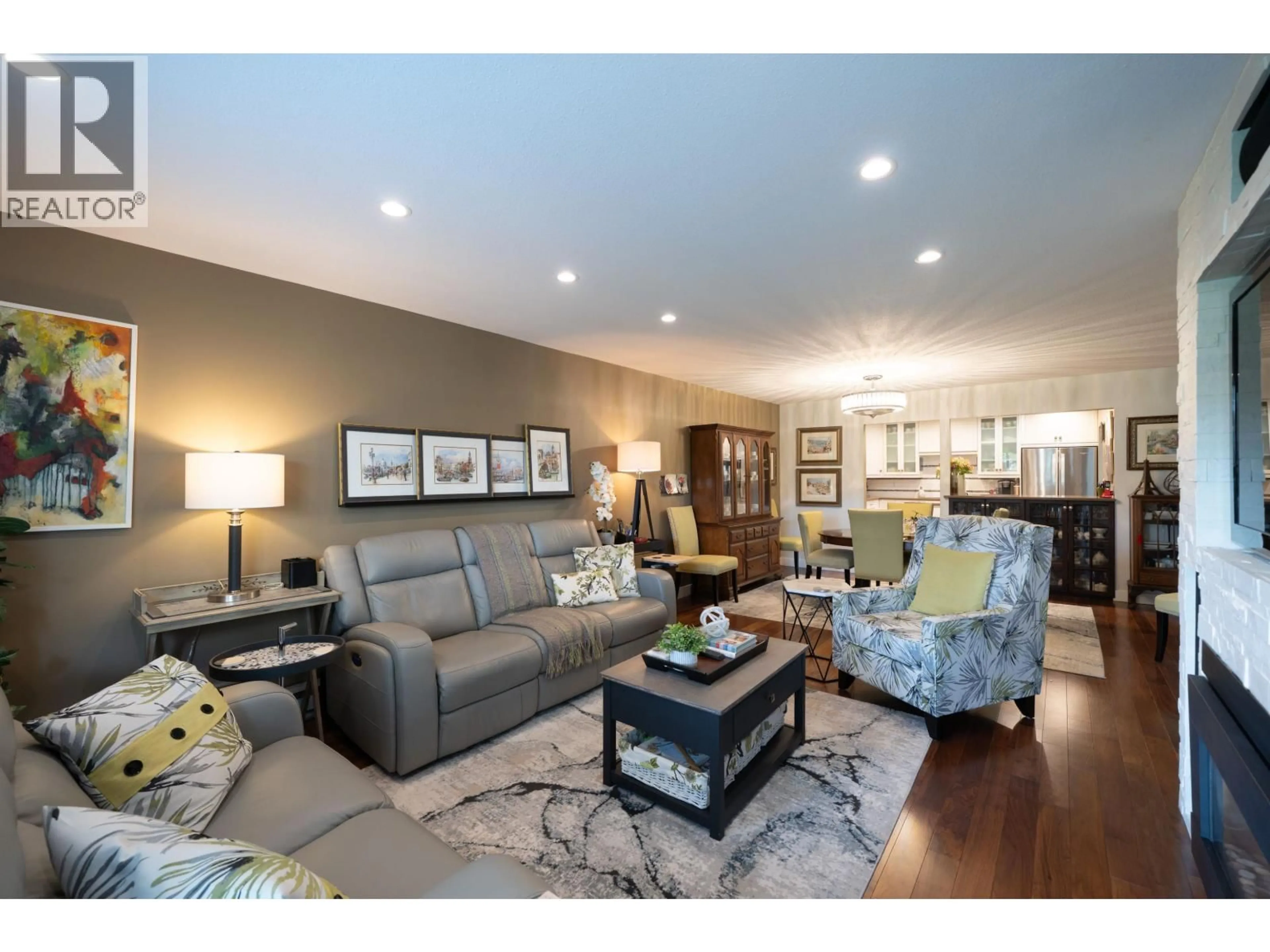 Living room with furniture, wood/laminate floor for 113 - 11601 227 STREET, Maple Ridge British Columbia V2X0J7