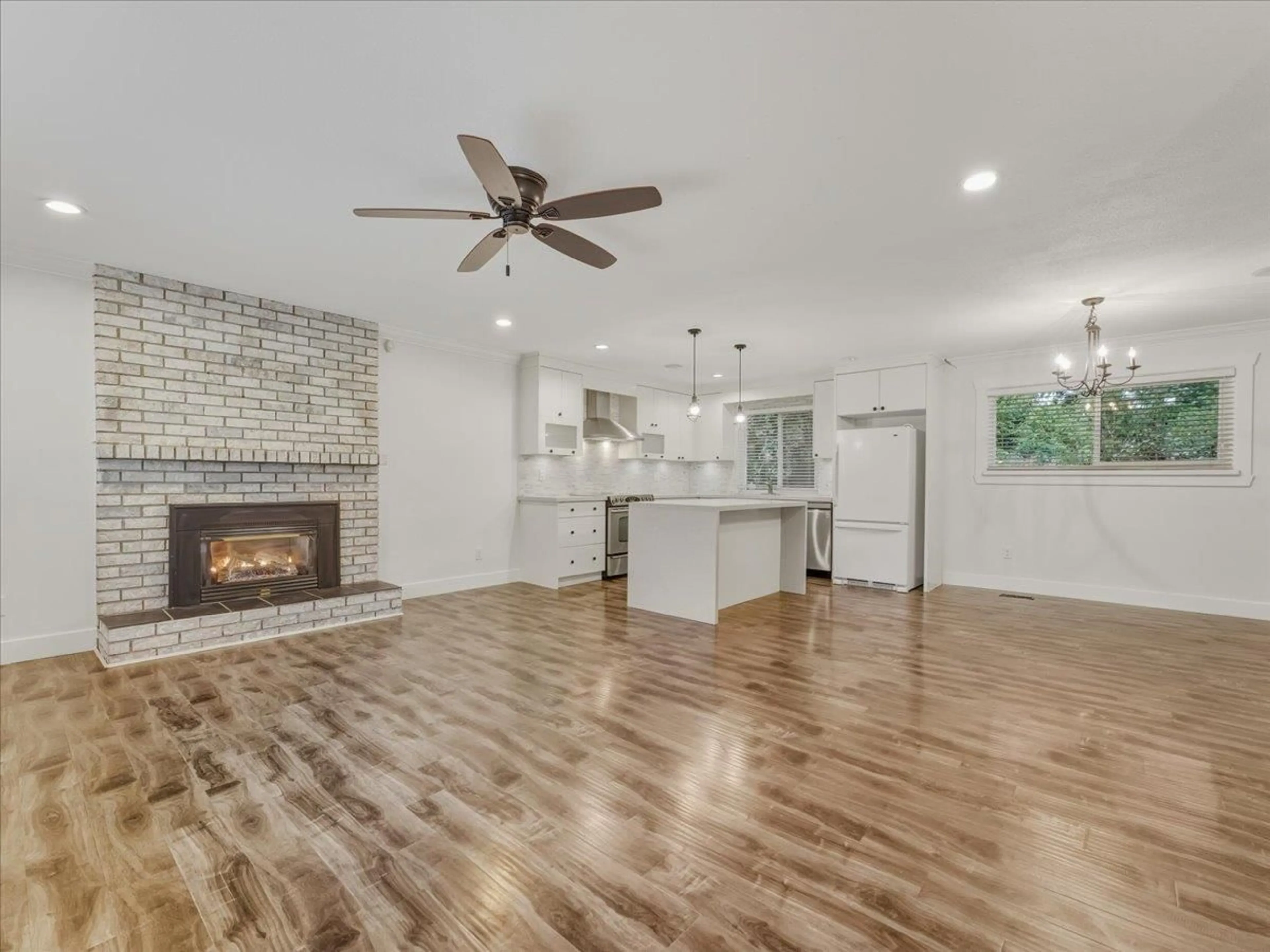 Open concept kitchen, wood/laminate floor for 3976 205B STREET, Langley British Columbia V3A2B3