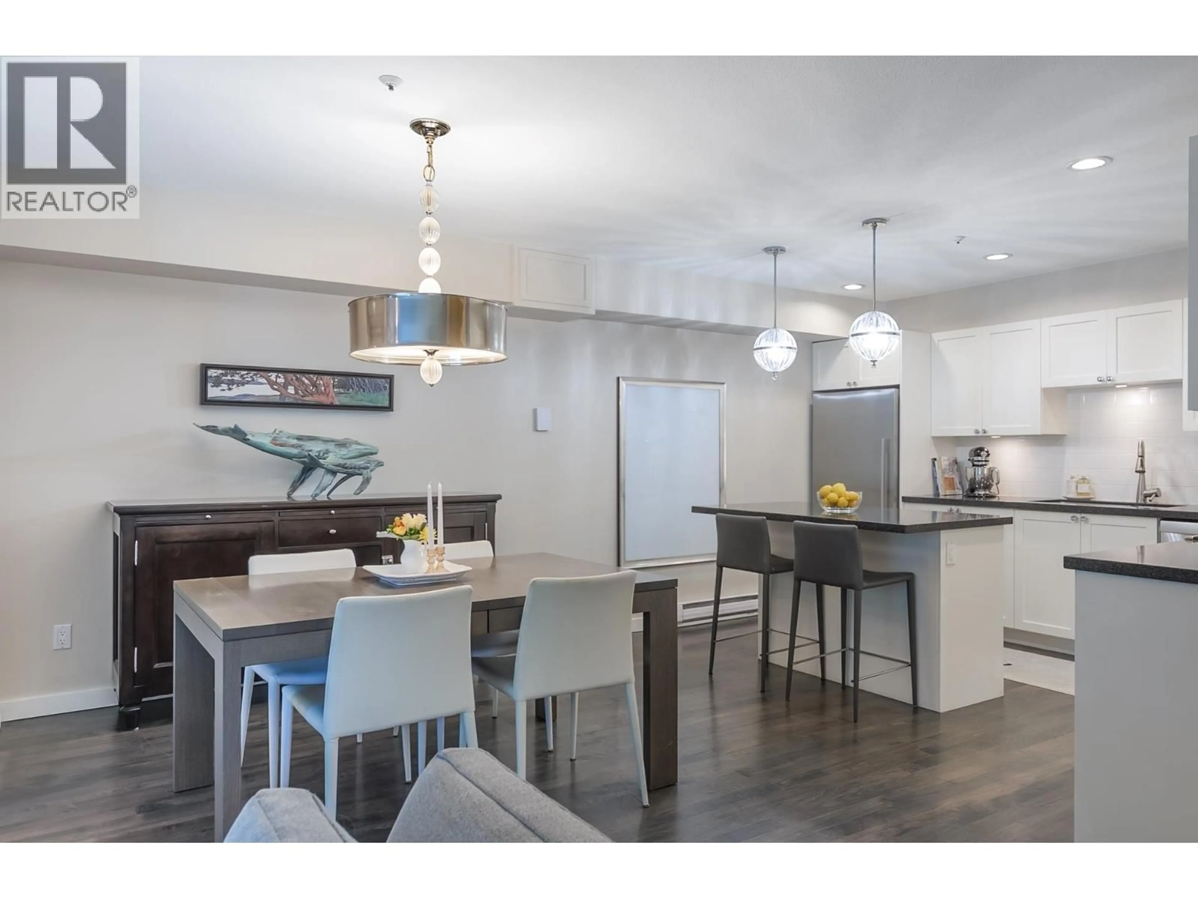 Open concept kitchen, wood/laminate floor for 796 15TH AVENUE, Vancouver British Columbia V5Z1R5