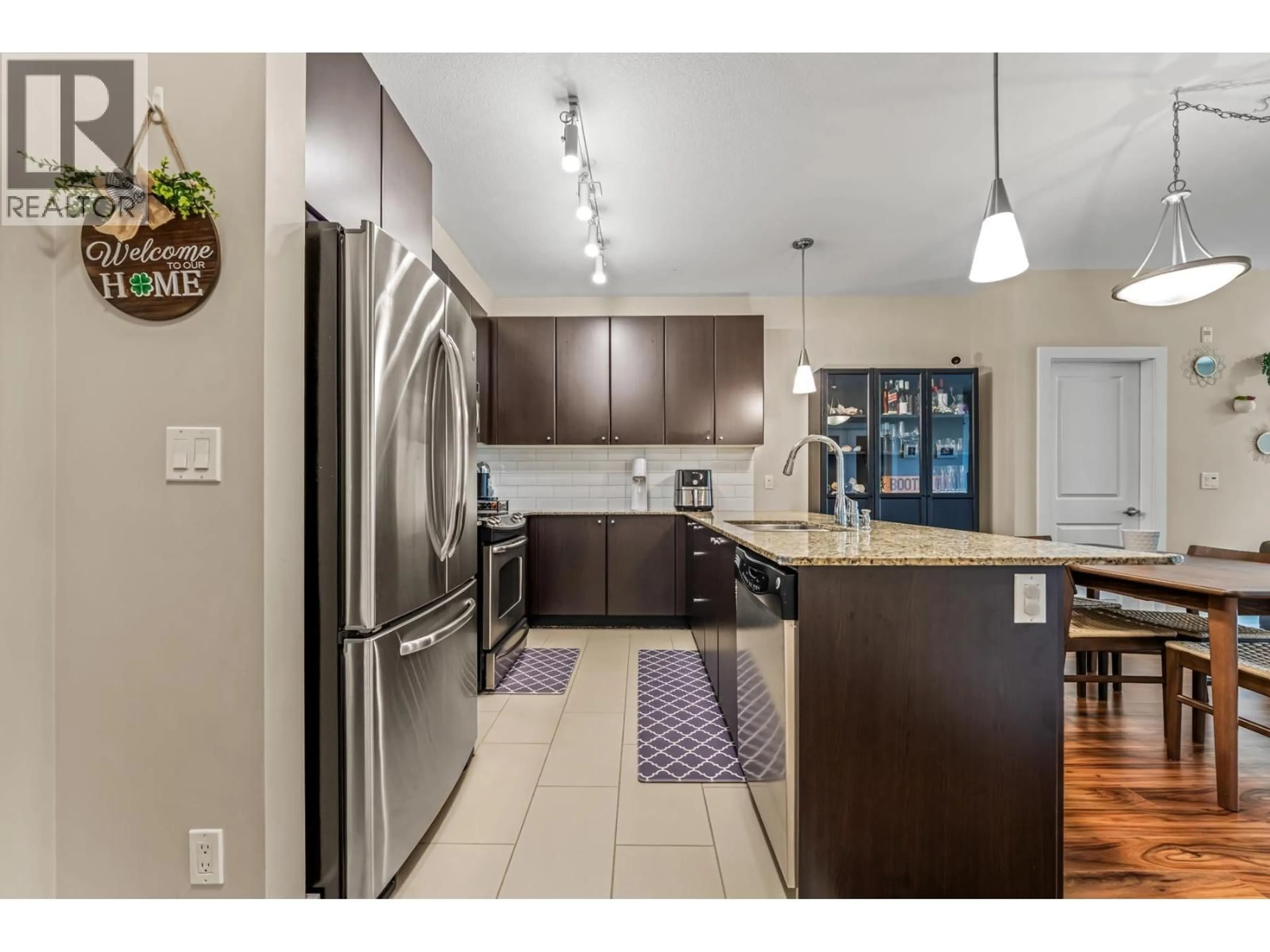 Open concept kitchen, unknown for 102 - 250 FRANCIS WAY, New Westminster British Columbia V3L0E6
