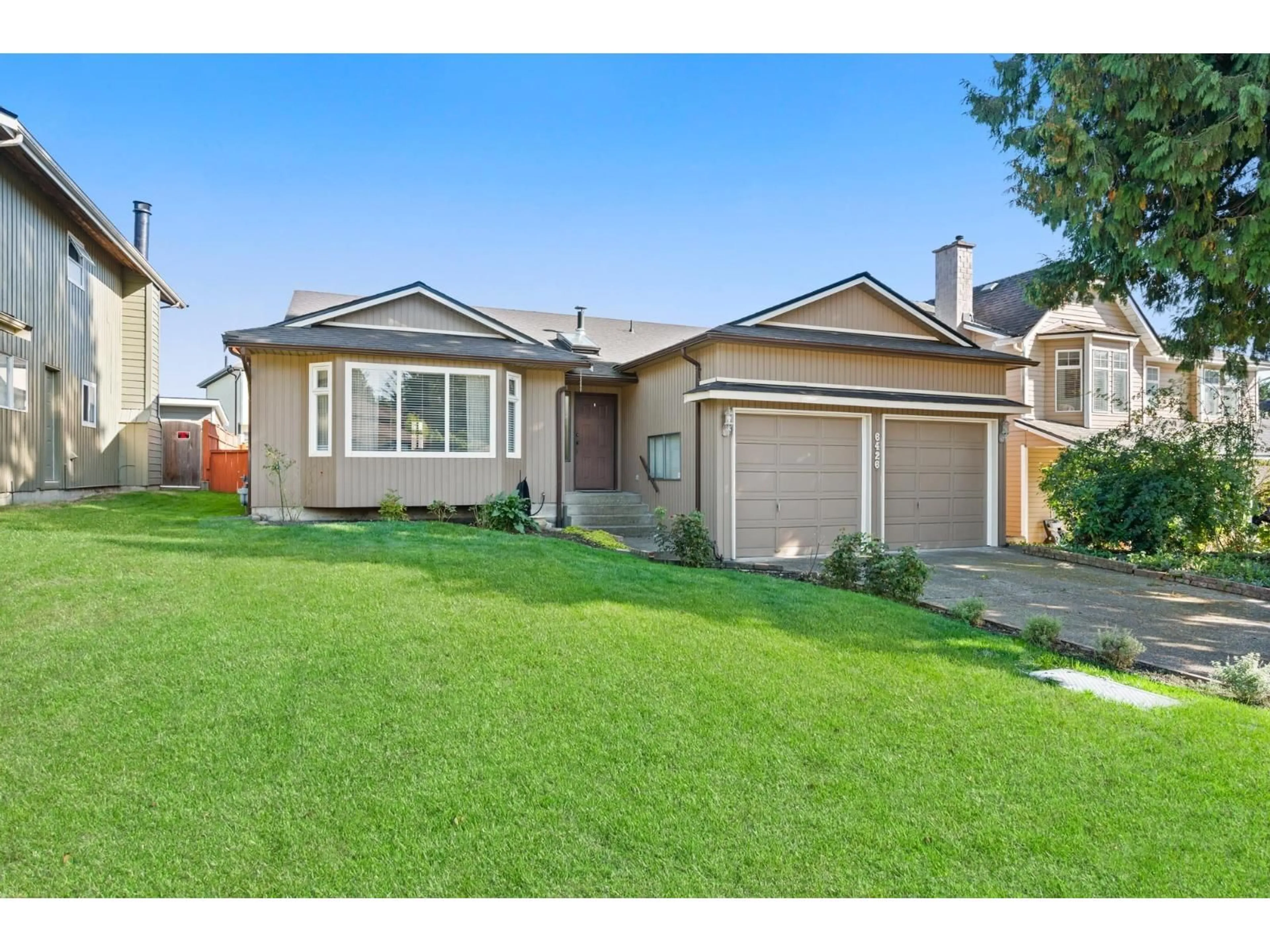 Home with vinyl exterior material, street for 6426 WADE ROAD, Delta British Columbia V4E3H9