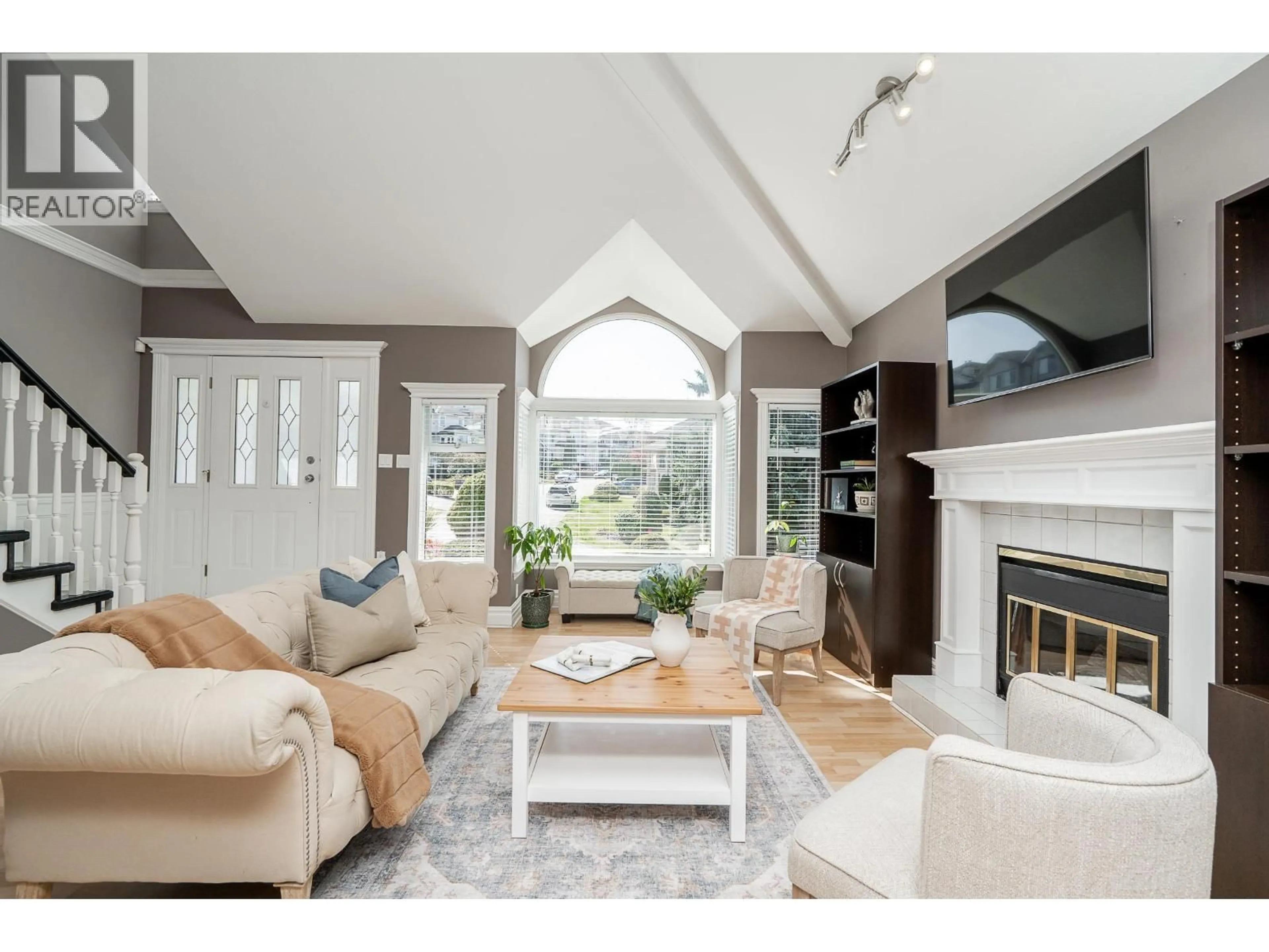 Living room with furniture, wood/laminate floor for 2653 KLASSEN COURT, Port Coquitlam British Columbia V3C5Y8