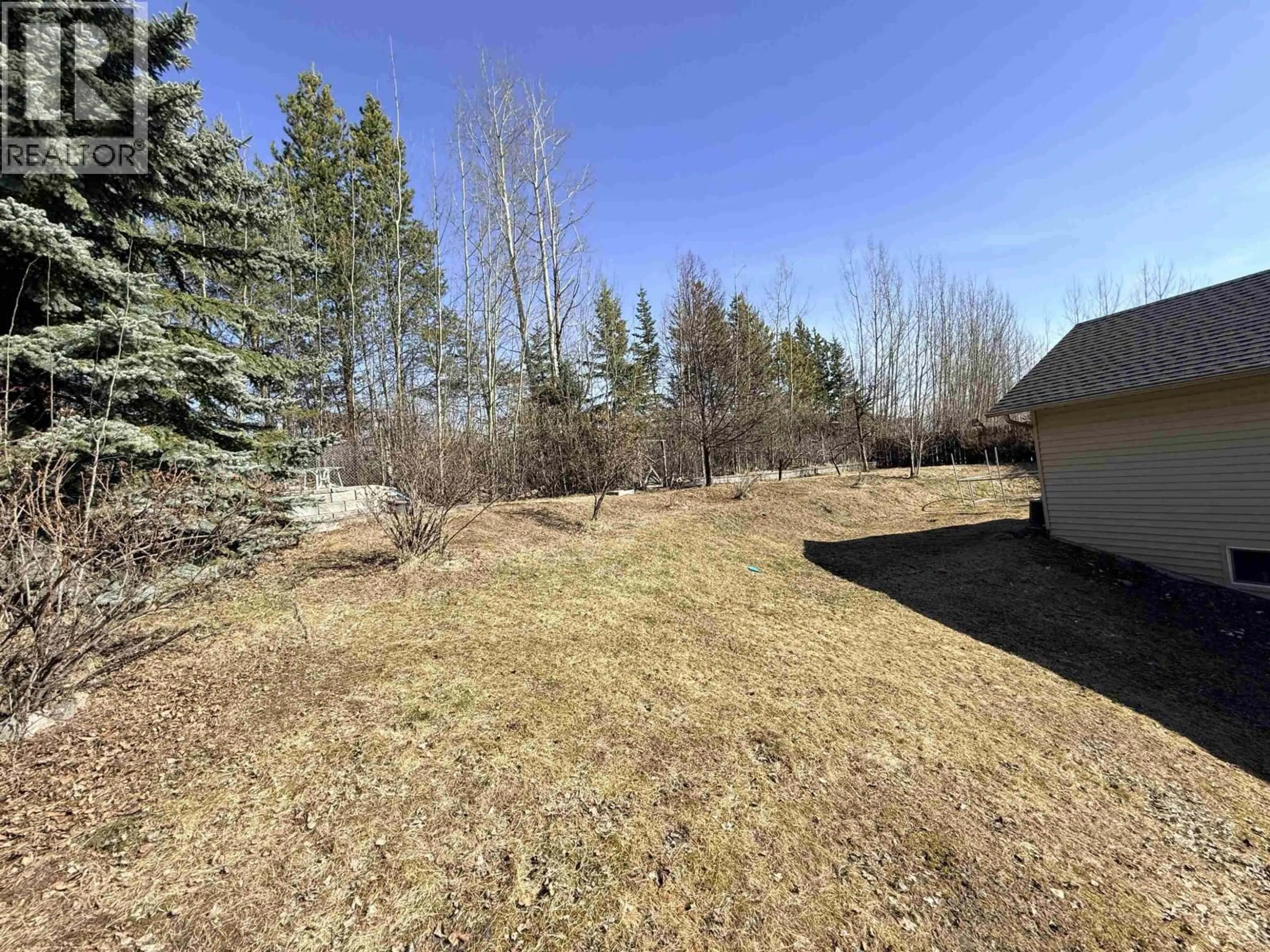 A pic from outside/outdoor area/front of a property/back of a property/a pic from drone, forest/trees view for 3379 ST FRANCES COURT, Prince George British Columbia V2N5A4