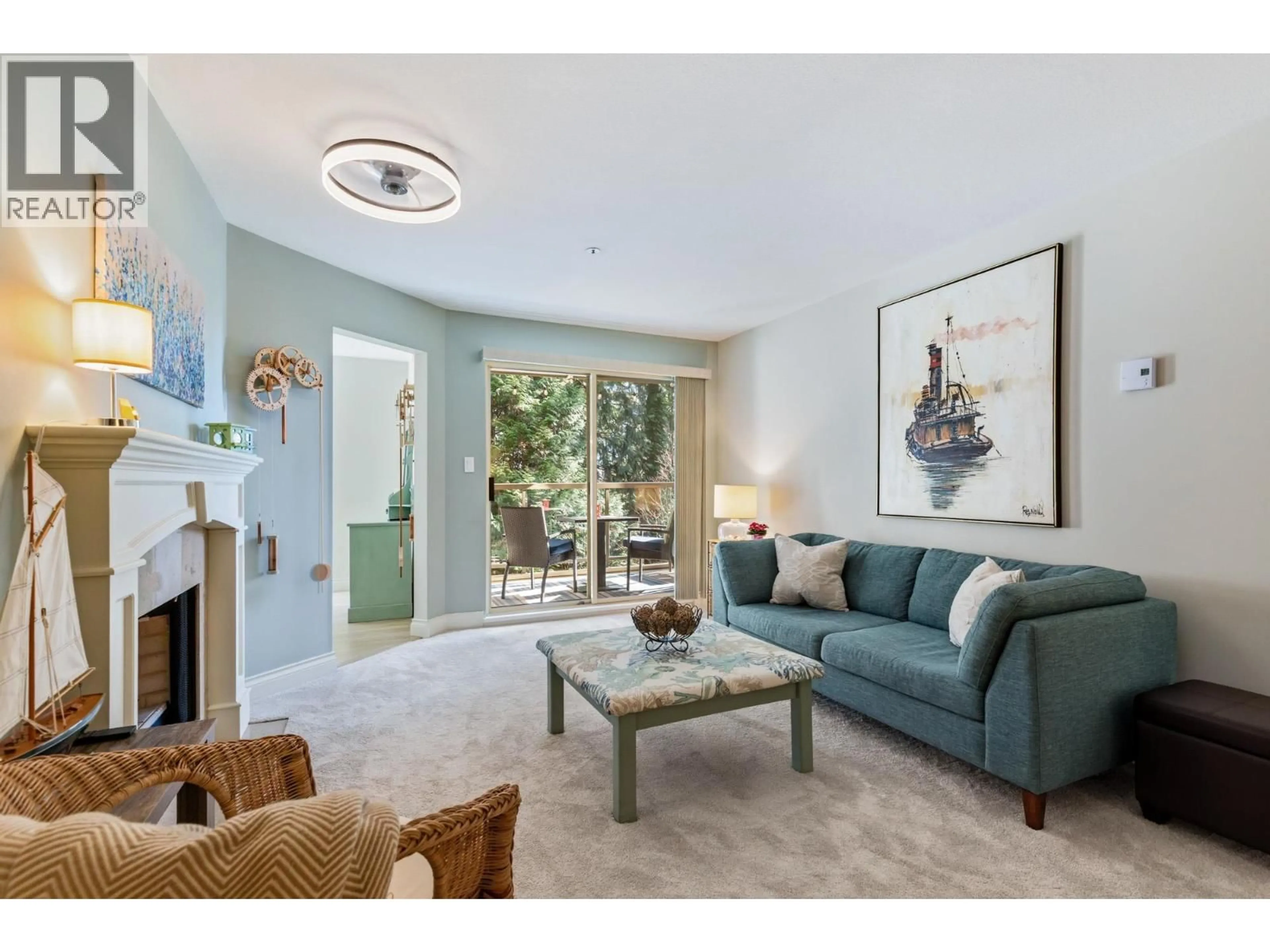 Living room with furniture, unknown for 201 - 180 RAVINE DRIVE, Port Moody British Columbia V3H4Z3