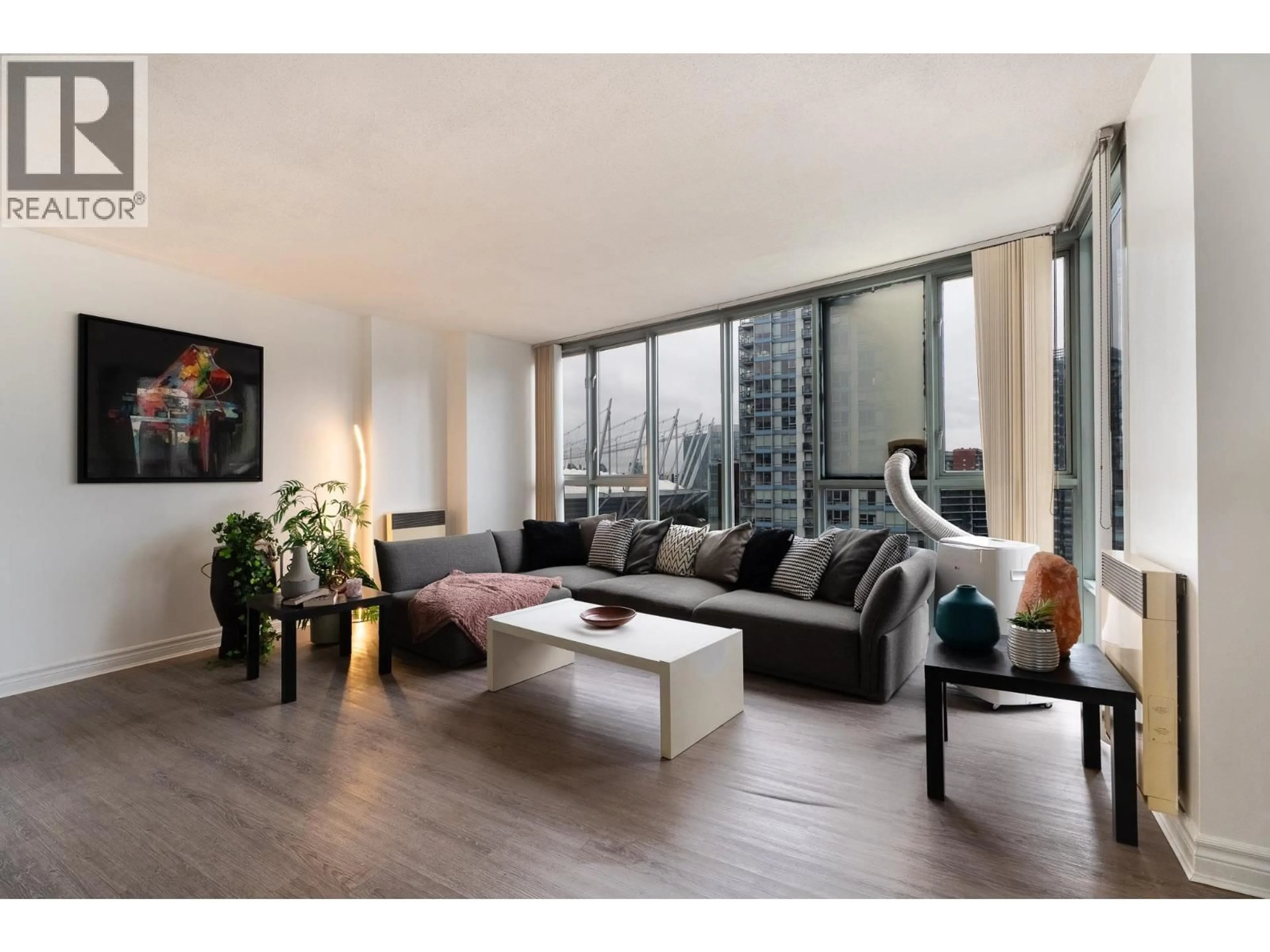 Living room with furniture, wood/laminate floor for 2102 - 930 CAMBIE STREET, Vancouver British Columbia V6B5X6