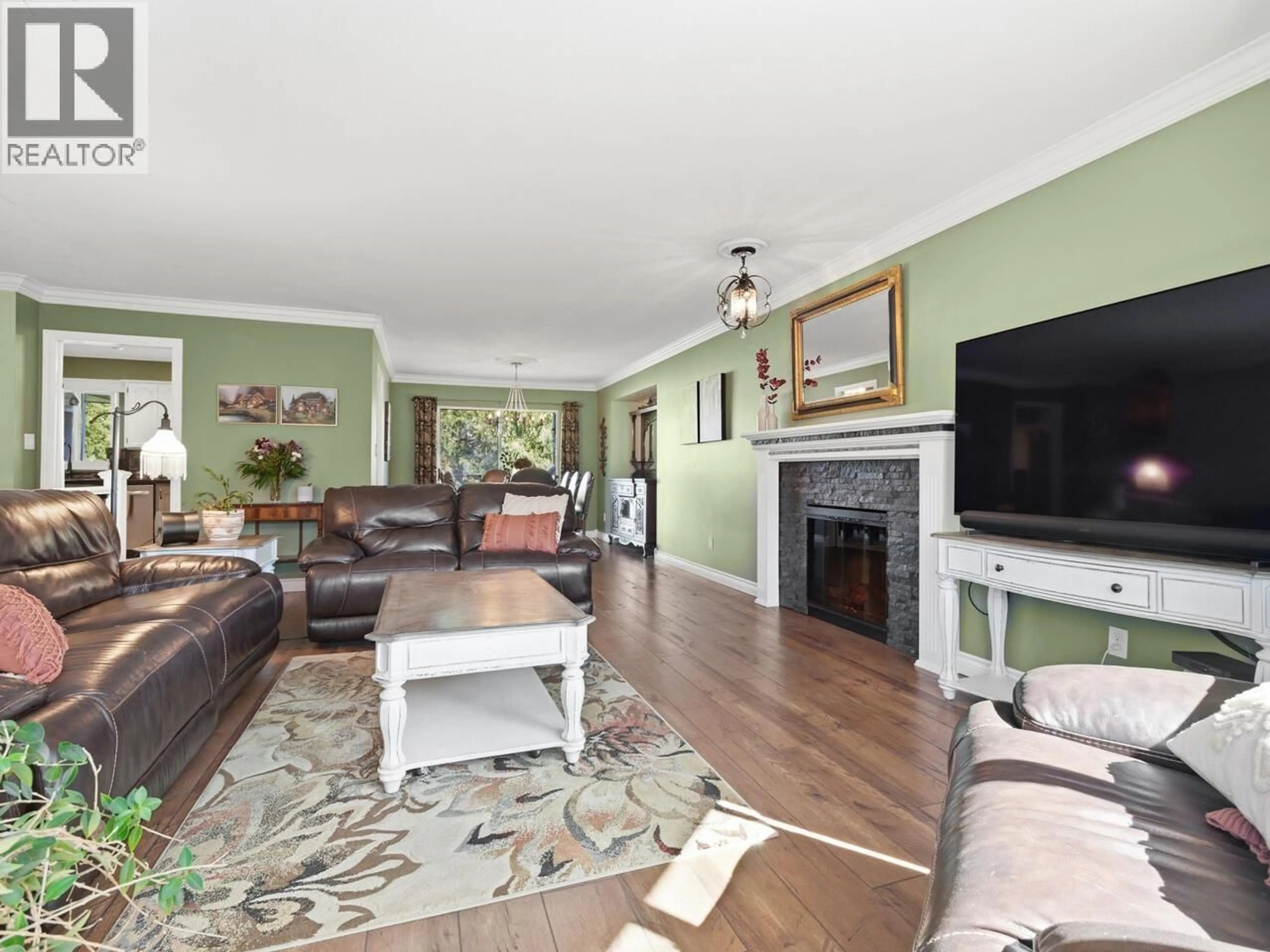 Living room with furniture, wood/laminate floor for 23019 122A AVENUE, Maple Ridge British Columbia V2X0X3