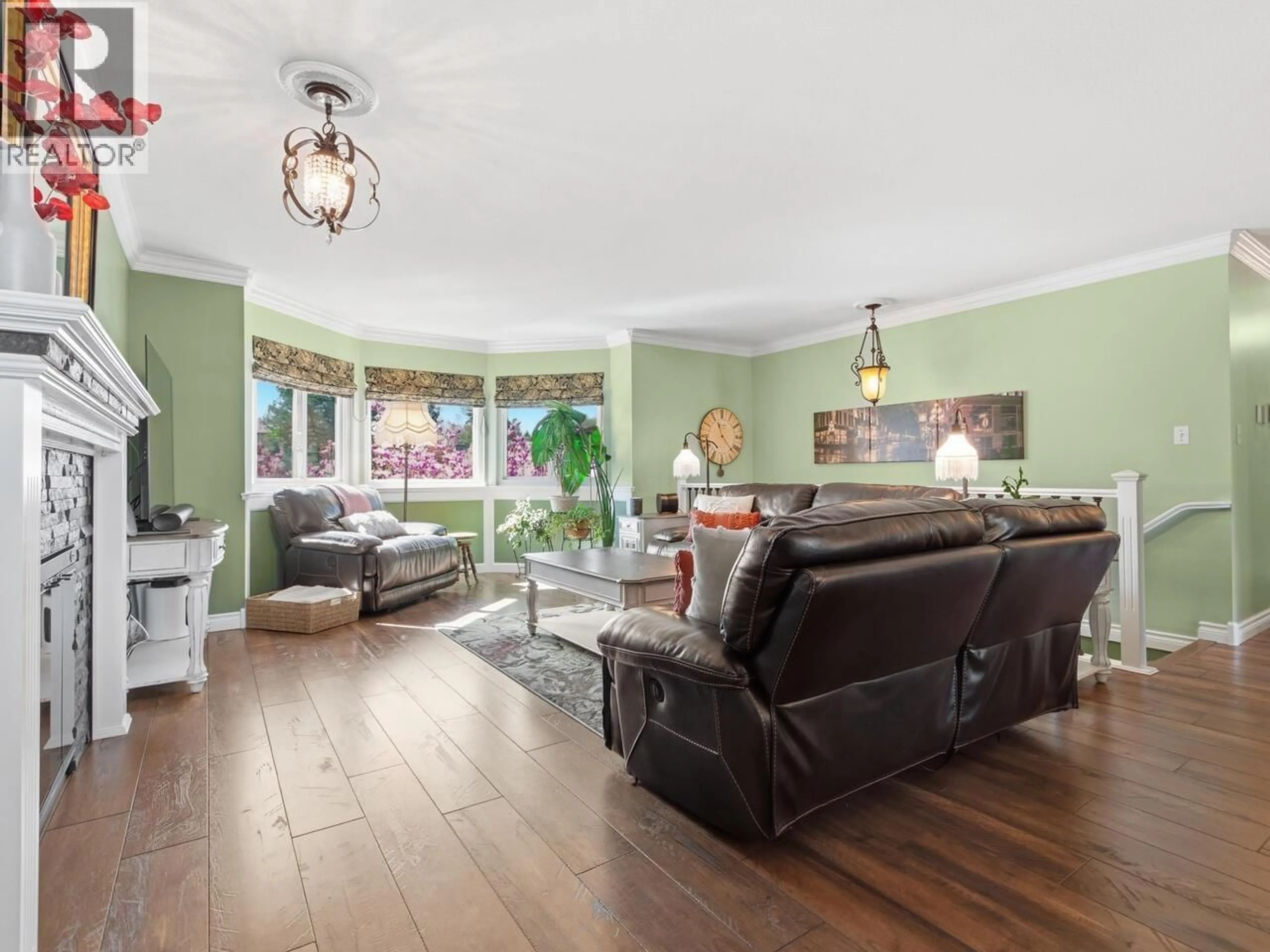Living room with furniture, wood/laminate floor for 23019 122A AVENUE, Maple Ridge British Columbia V2X0X3