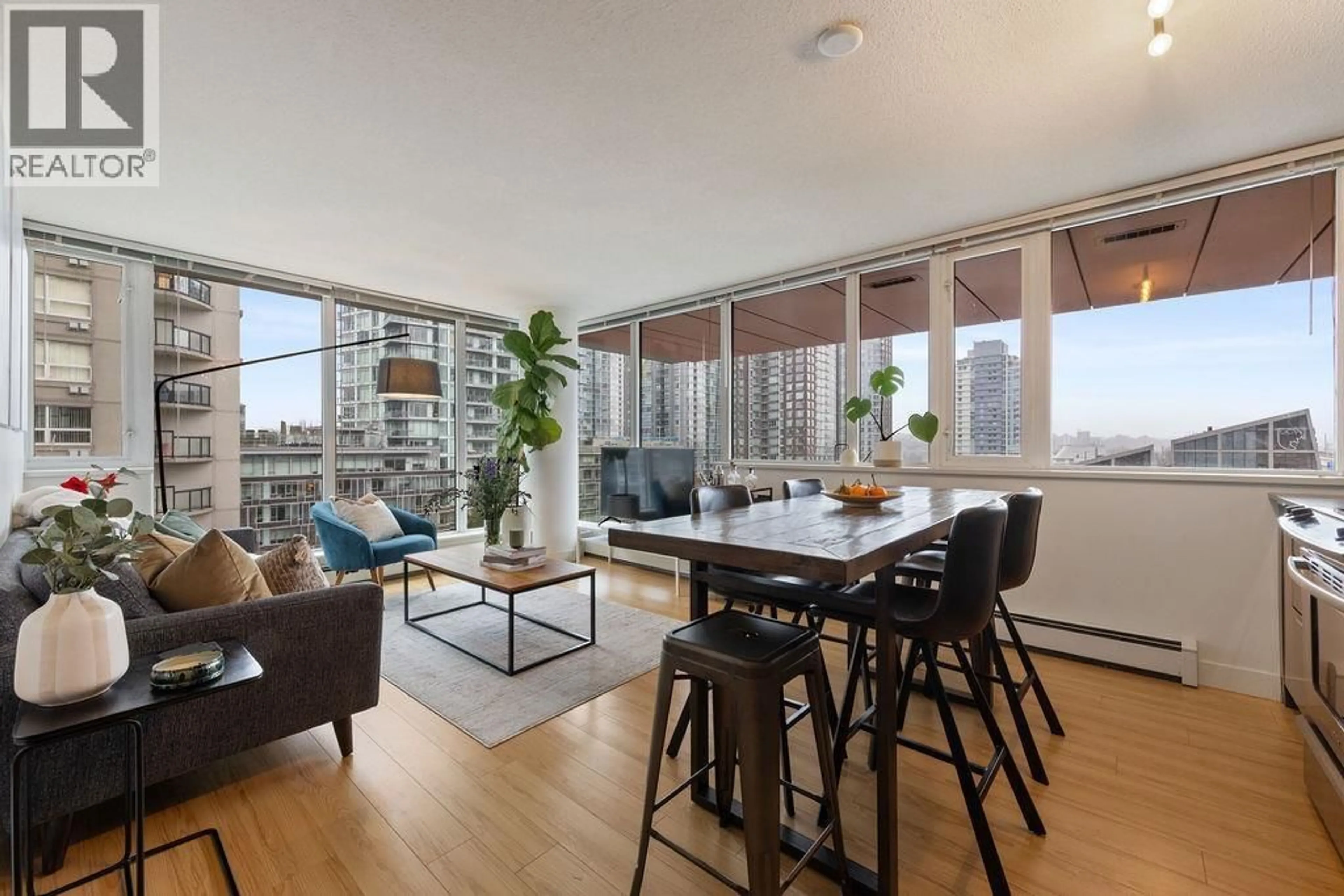 Living room with furniture, wood/laminate floor for 609 - 1325 ROLSTON STREET, Vancouver British Columbia V6B0M2