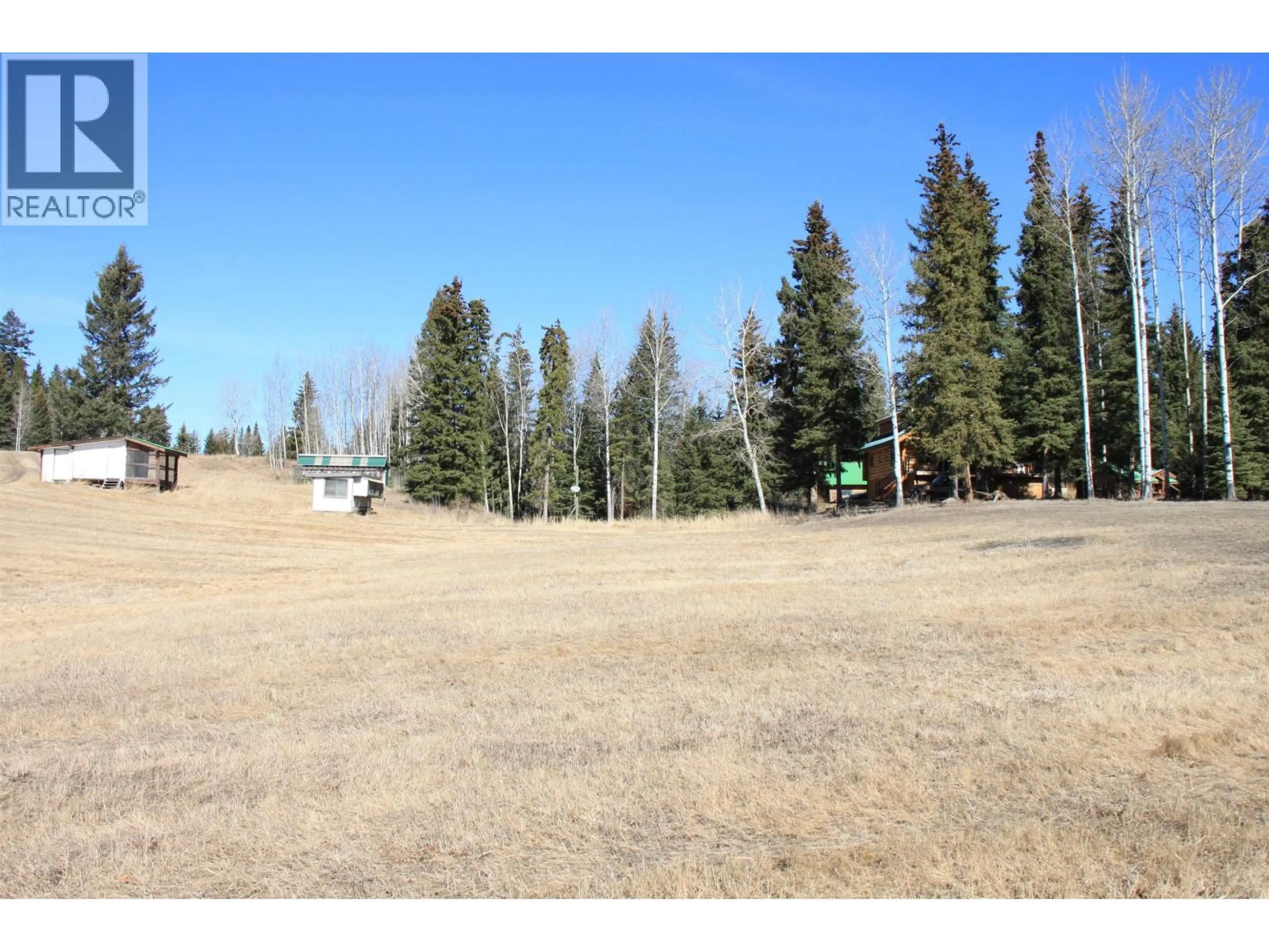 A pic from outside/outdoor area/front of a property/back of a property/a pic from drone, forest/trees view for 8025 BONAPARTE ROAD, Bridge Lake British Columbia V0K1E0