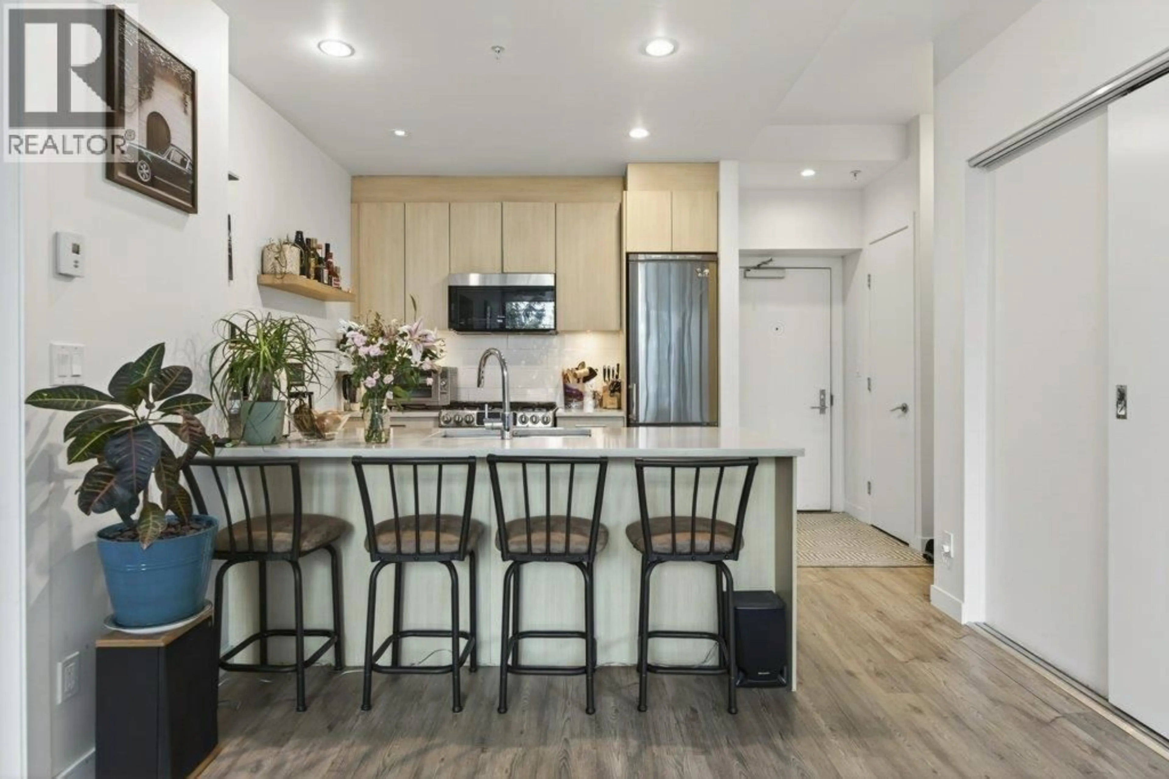 Open concept kitchen, unknown for 210 - 9080 UNIVERSITY CRESCENT, Burnaby British Columbia V5A0B7