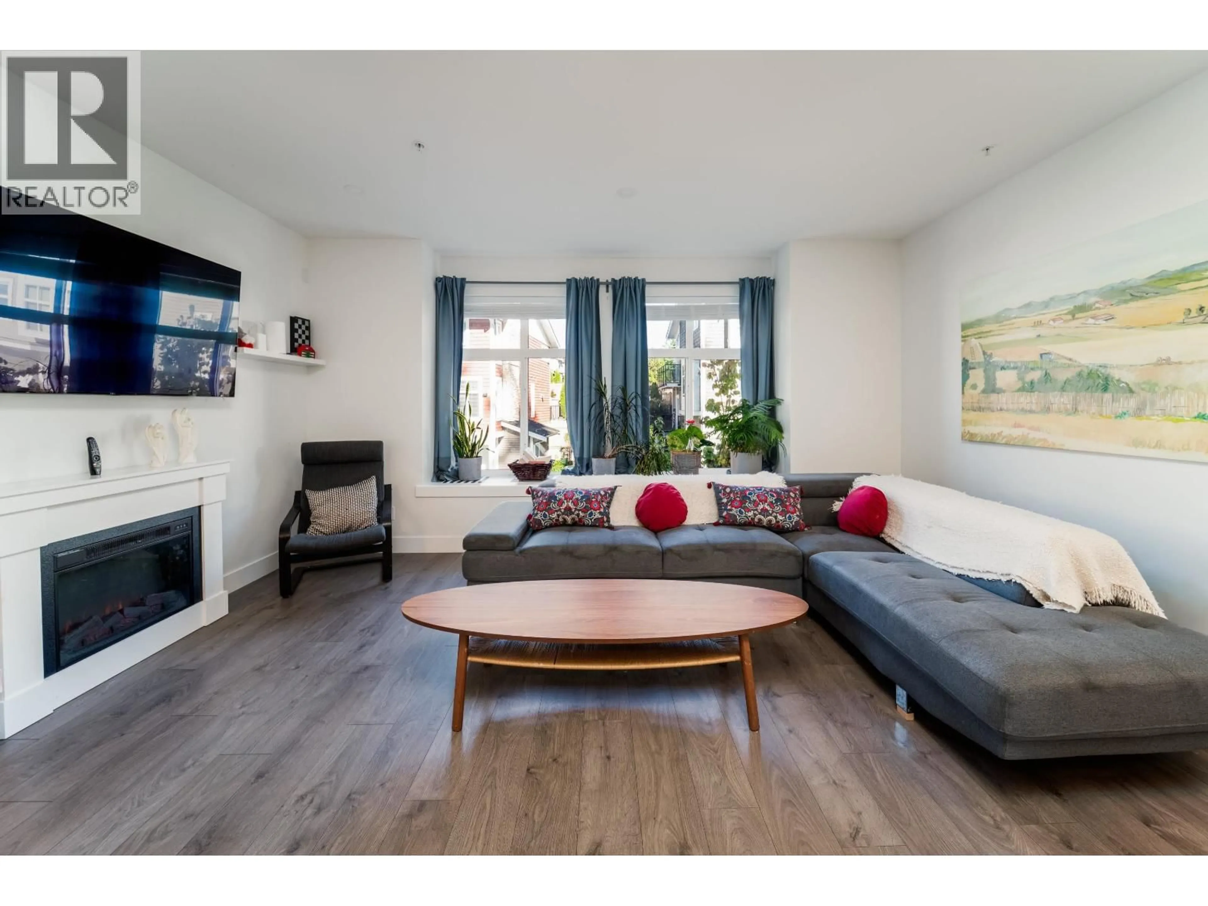 Living room with furniture, wood/laminate floor for 66 - 24108 104 AVENUE, Maple Ridge British Columbia V2W0J5