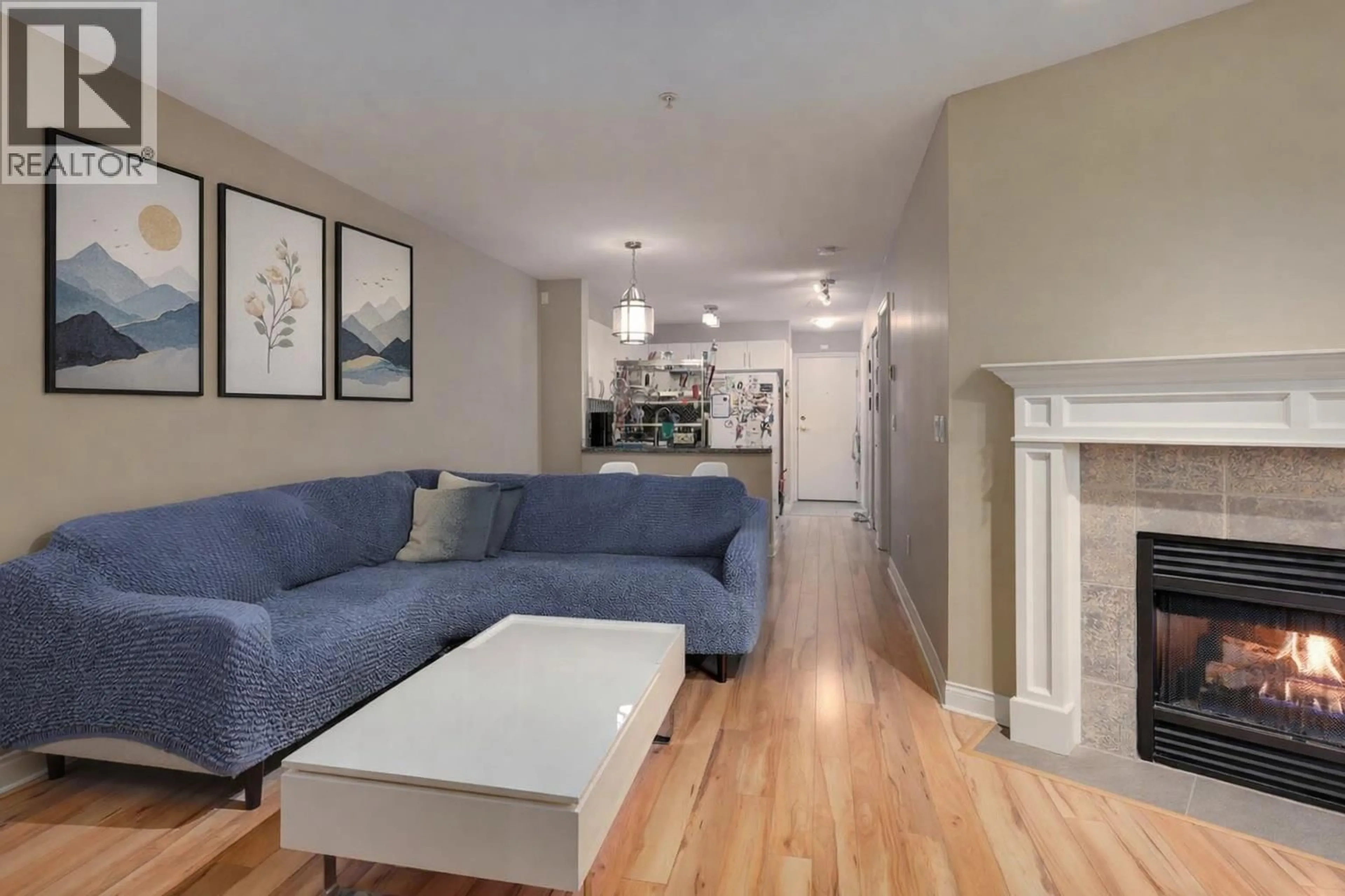 Living room with furniture, wood/laminate floor for 209 - 688 16TH AVENUE, Vancouver British Columbia V5T2V4