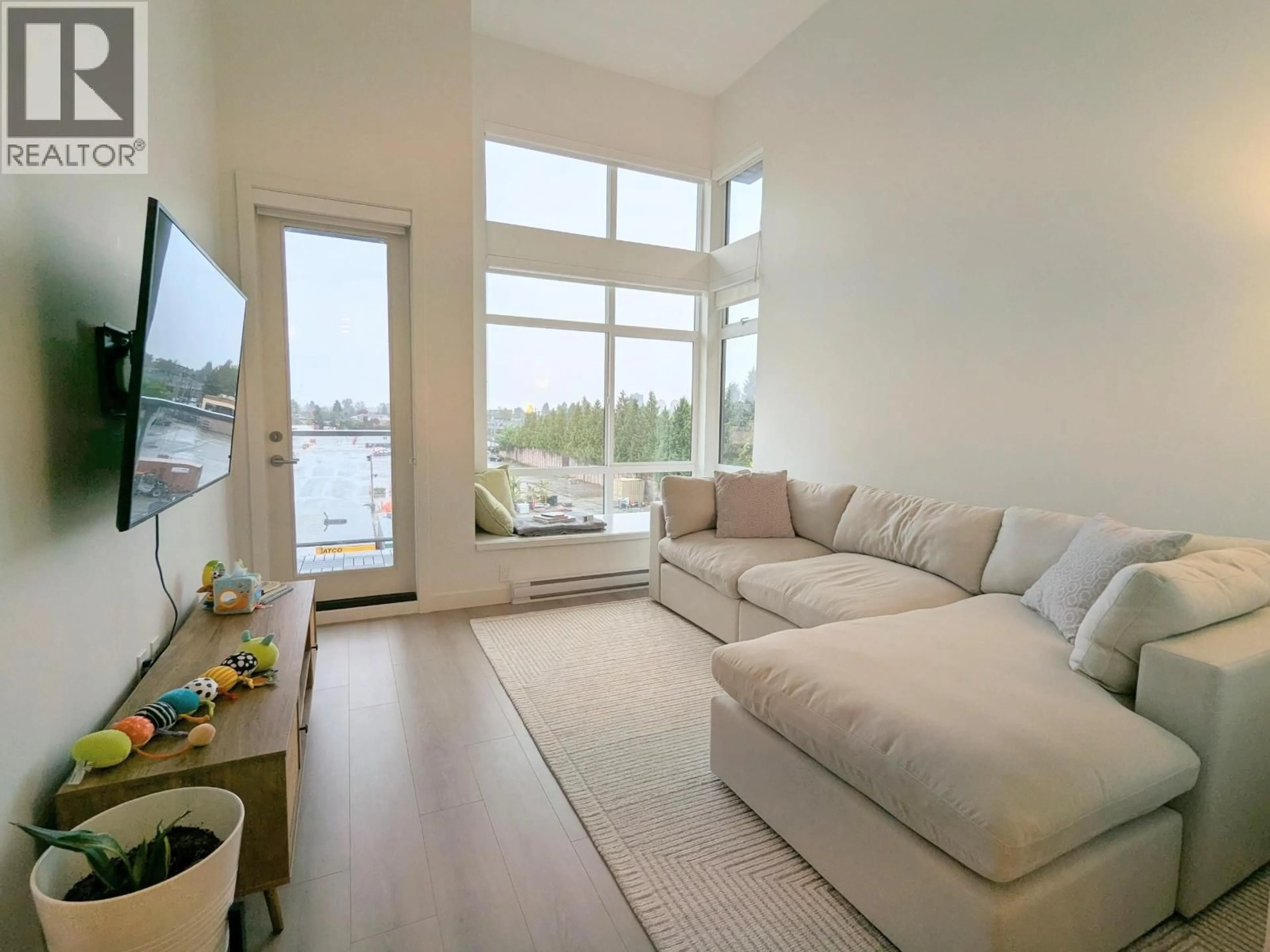 Living room with furniture, unknown for 406 - 7799 17TH STREET, Burnaby British Columbia V3N0J5