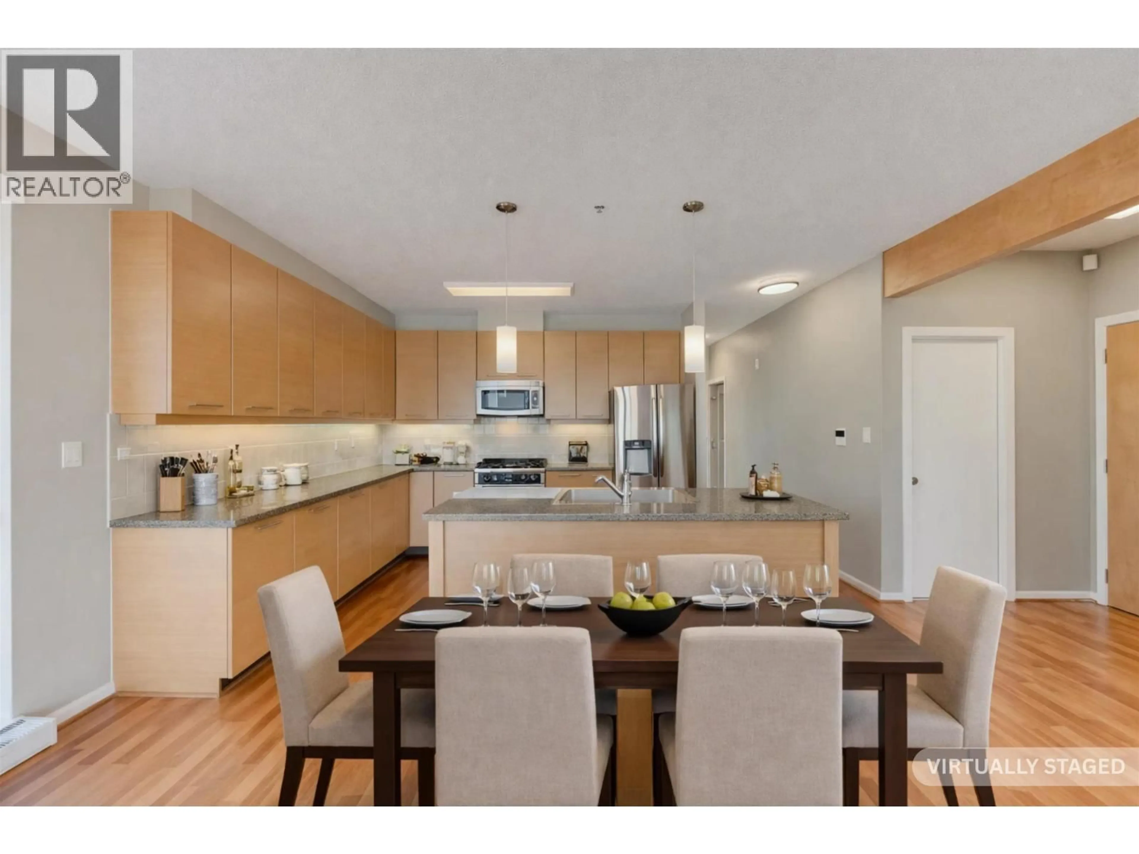 Open concept kitchen, wood/laminate floor for 510 - 530 RAVEN WOODS DRIVE, North Vancouver British Columbia V7G2T5
