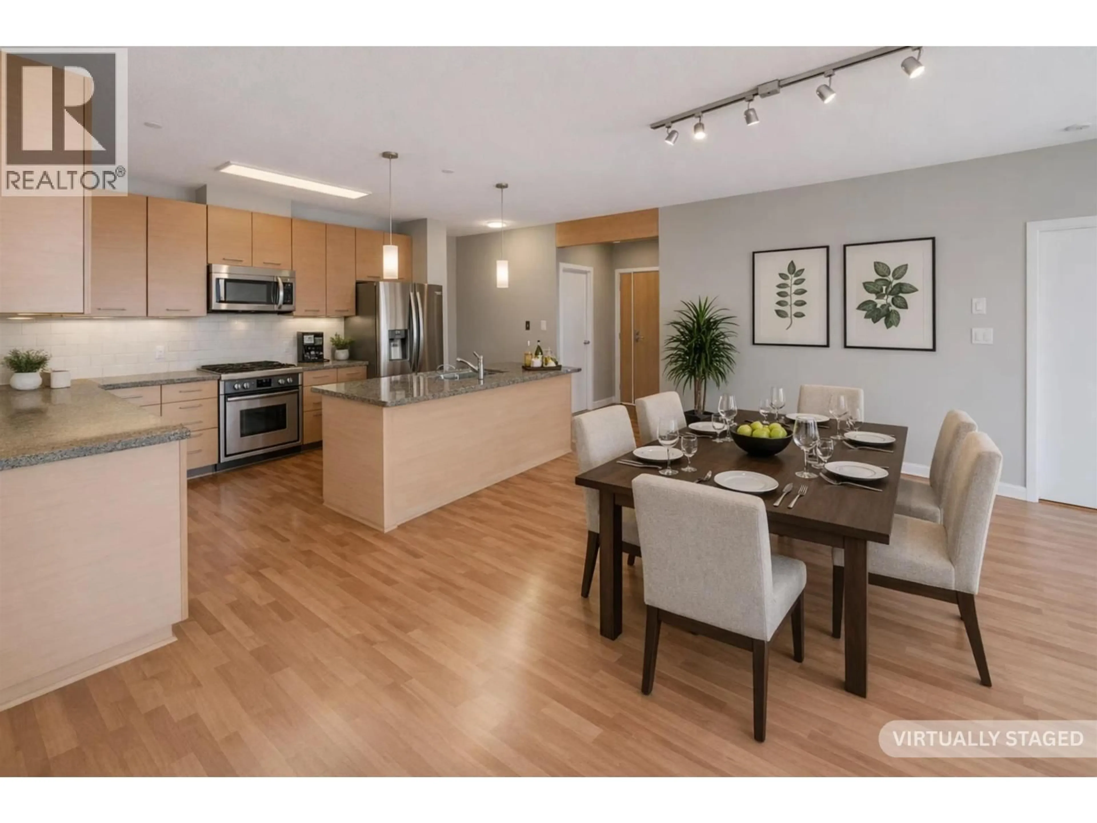 Open concept kitchen, wood/laminate floor for 510 - 530 RAVEN WOODS DRIVE, North Vancouver British Columbia V7G2T5