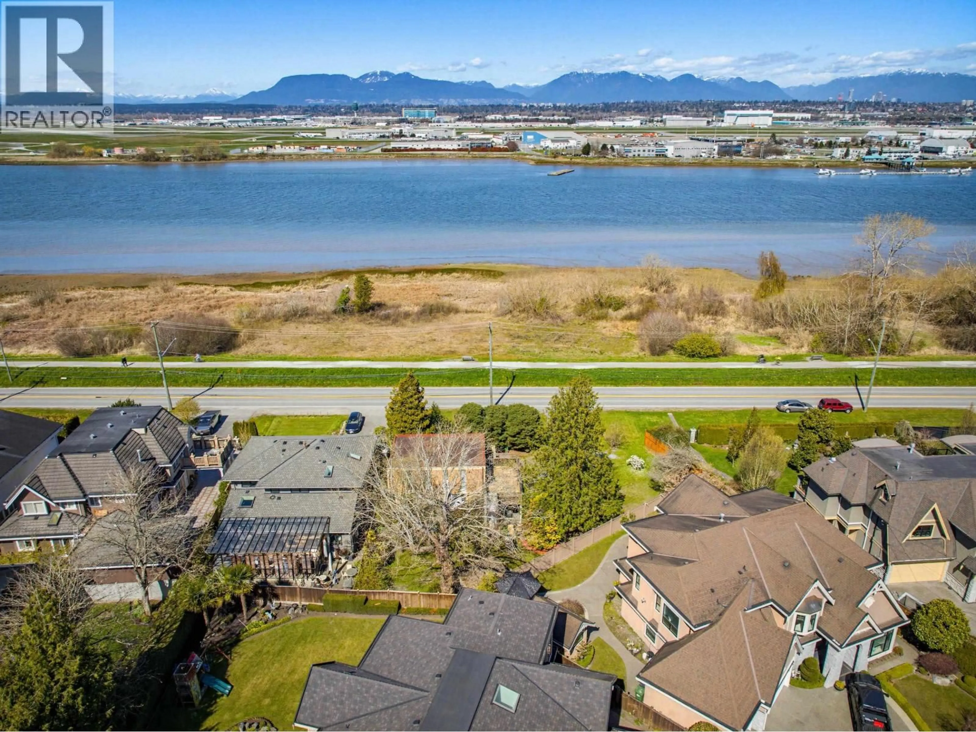 A pic from outside/outdoor area/front of a property/back of a property/a pic from drone, water/lake/river/ocean view for 4440 RIVER ROAD, Richmond British Columbia V7C1A3