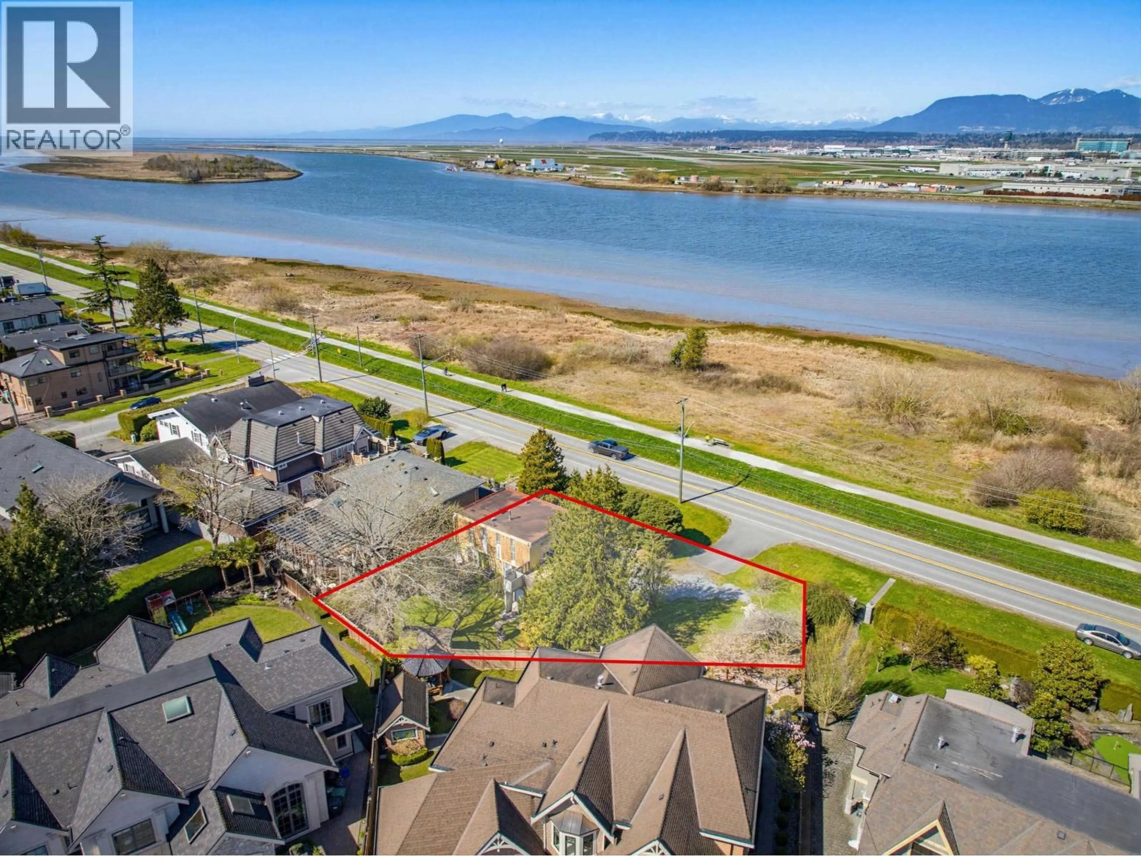 A pic from outside/outdoor area/front of a property/back of a property/a pic from drone, water/lake/river/ocean view for 4440 RIVER ROAD, Richmond British Columbia V7C1A3