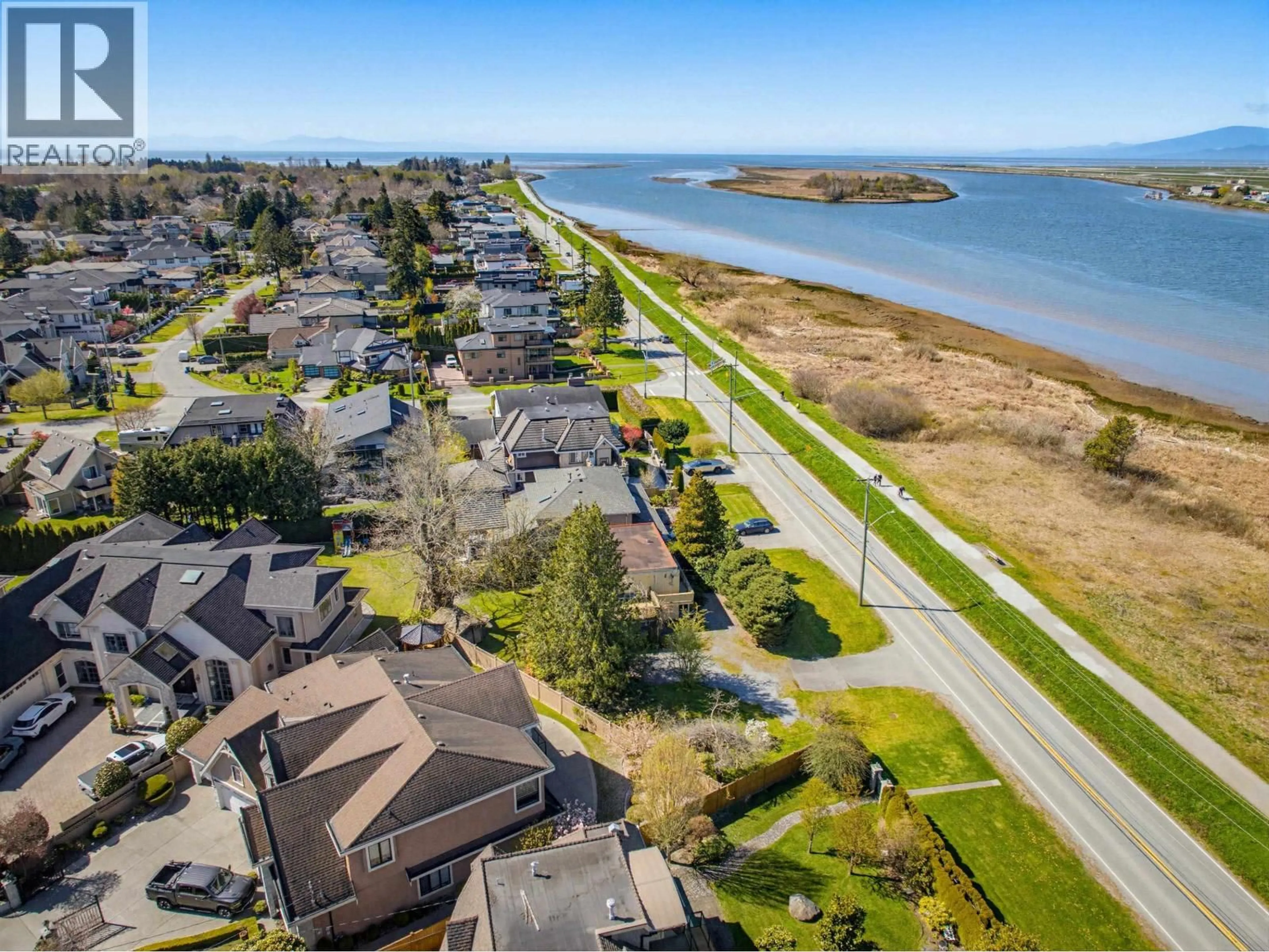 A pic from outside/outdoor area/front of a property/back of a property/a pic from drone, water/lake/river/ocean view for 4440 RIVER ROAD, Richmond British Columbia V7C1A3