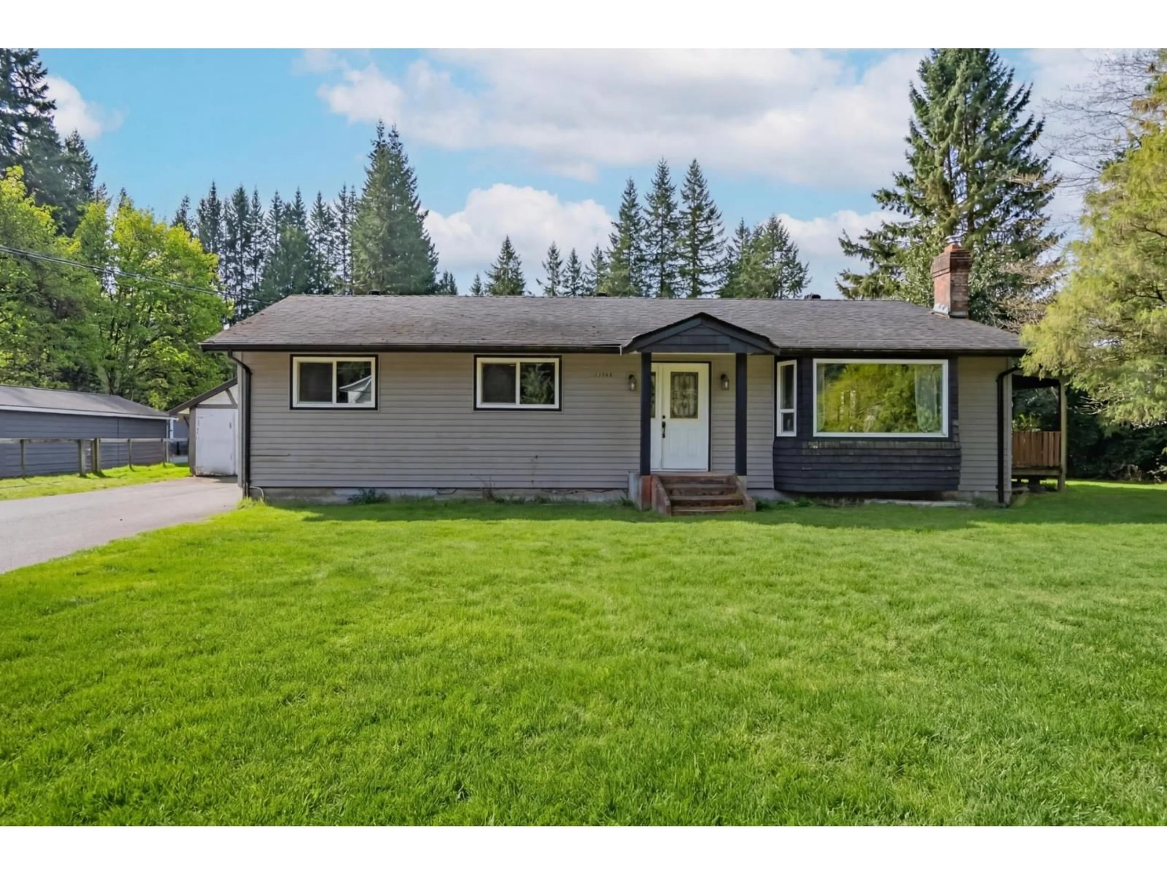 Home with vinyl exterior material, street for 23566 52 AVENUE, Langley British Columbia V2Z2P5