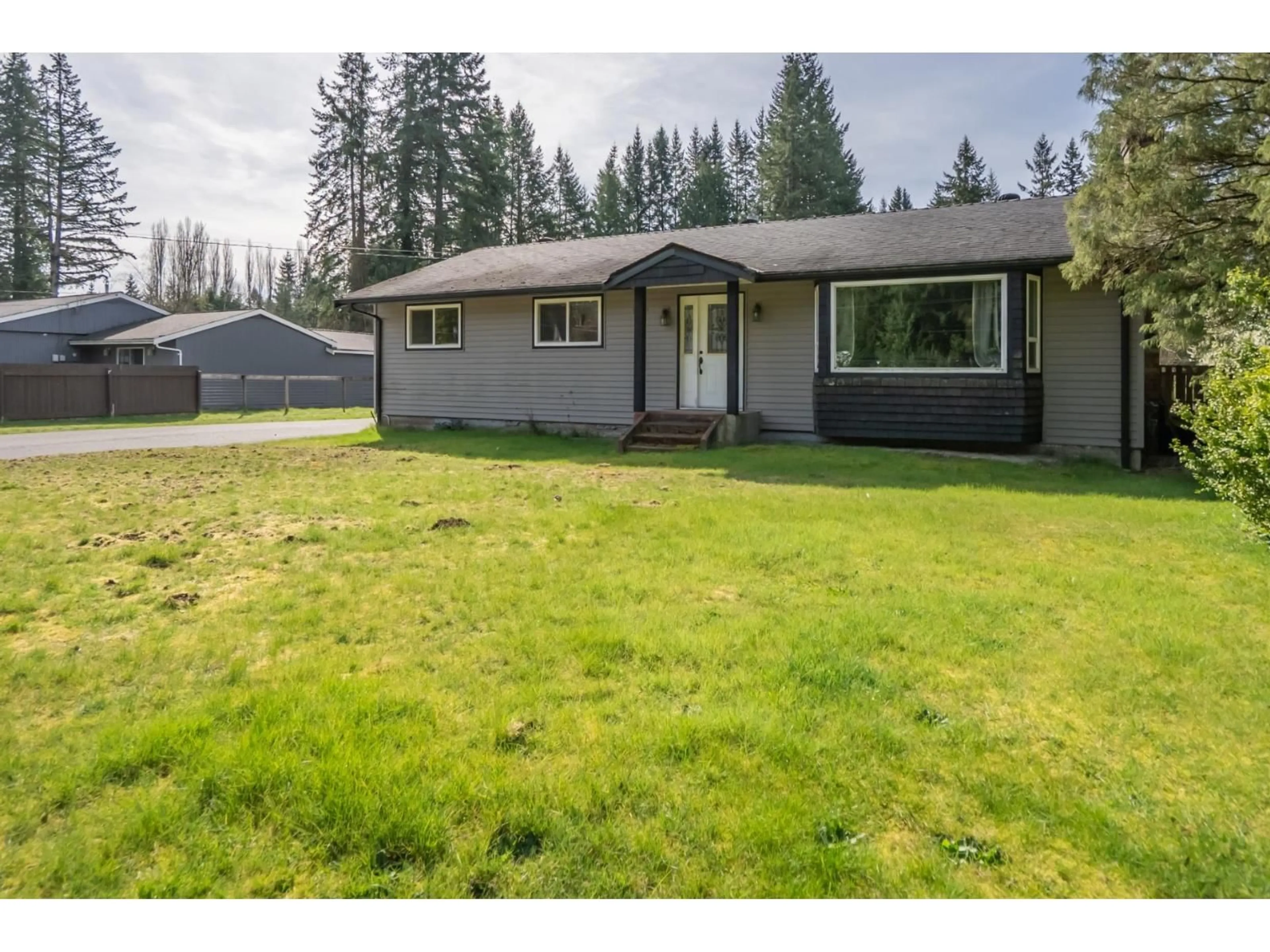 Home with vinyl exterior material, street for 23566 52 AVENUE, Langley British Columbia V2Z2P5