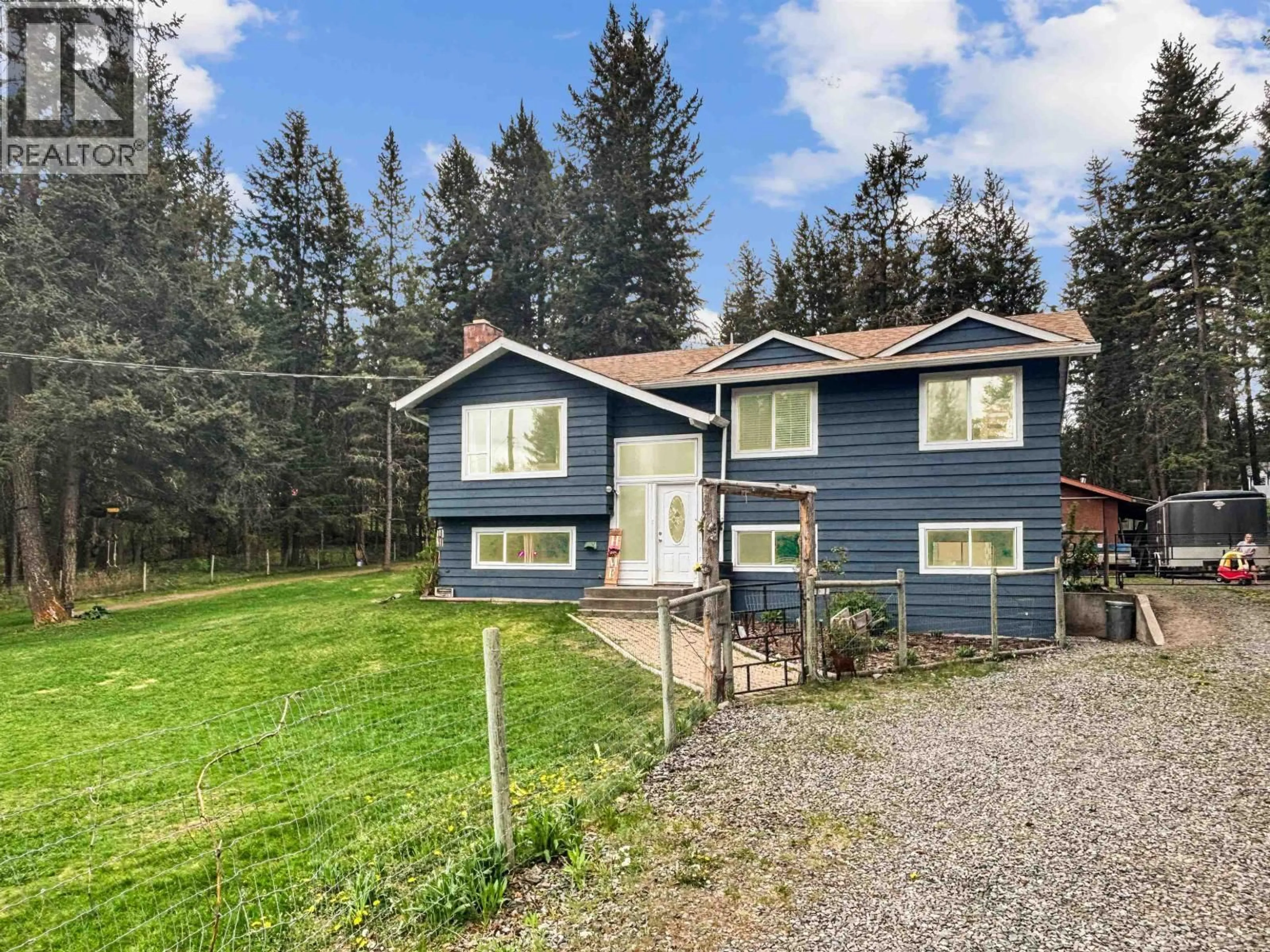 Home with vinyl exterior material, street for 5047 EASZEE DRIVE, 108 Mile Ranch British Columbia V0K2Z0