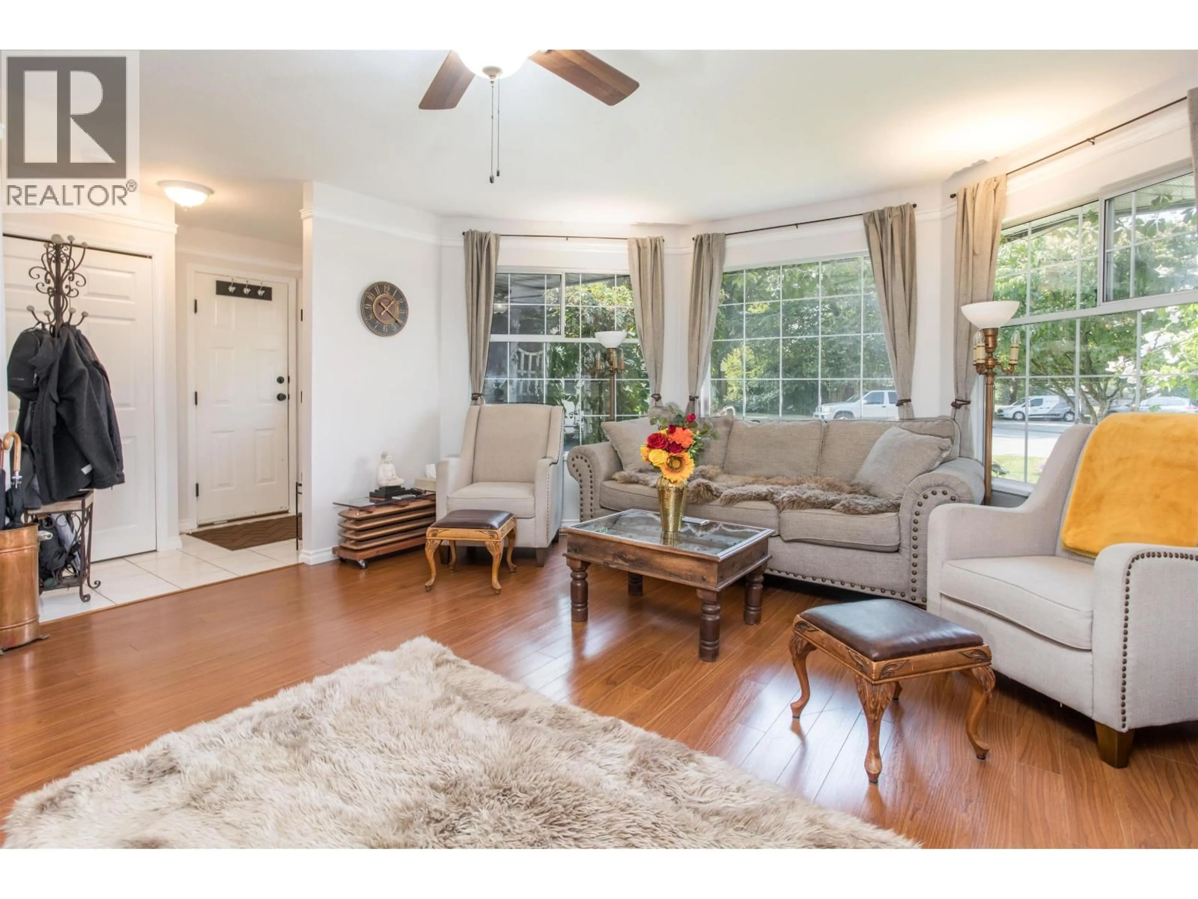 Living room with furniture, wood/laminate floor for 12388 NIKOLA STREET, Pitt Meadows British Columbia V3Y2K8