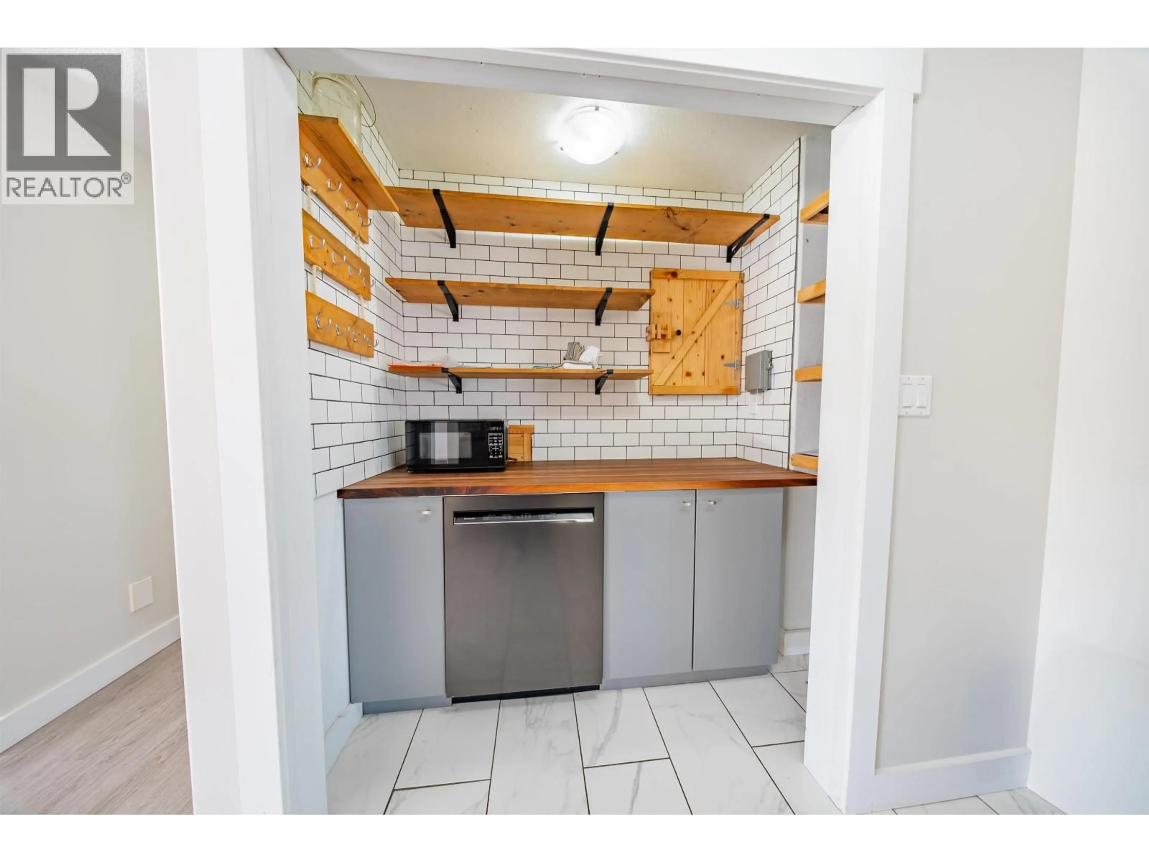 Standard kitchen, ceramic/tile floor for 9917 115 AVENUE, Fort St. John British Columbia V1J6R8