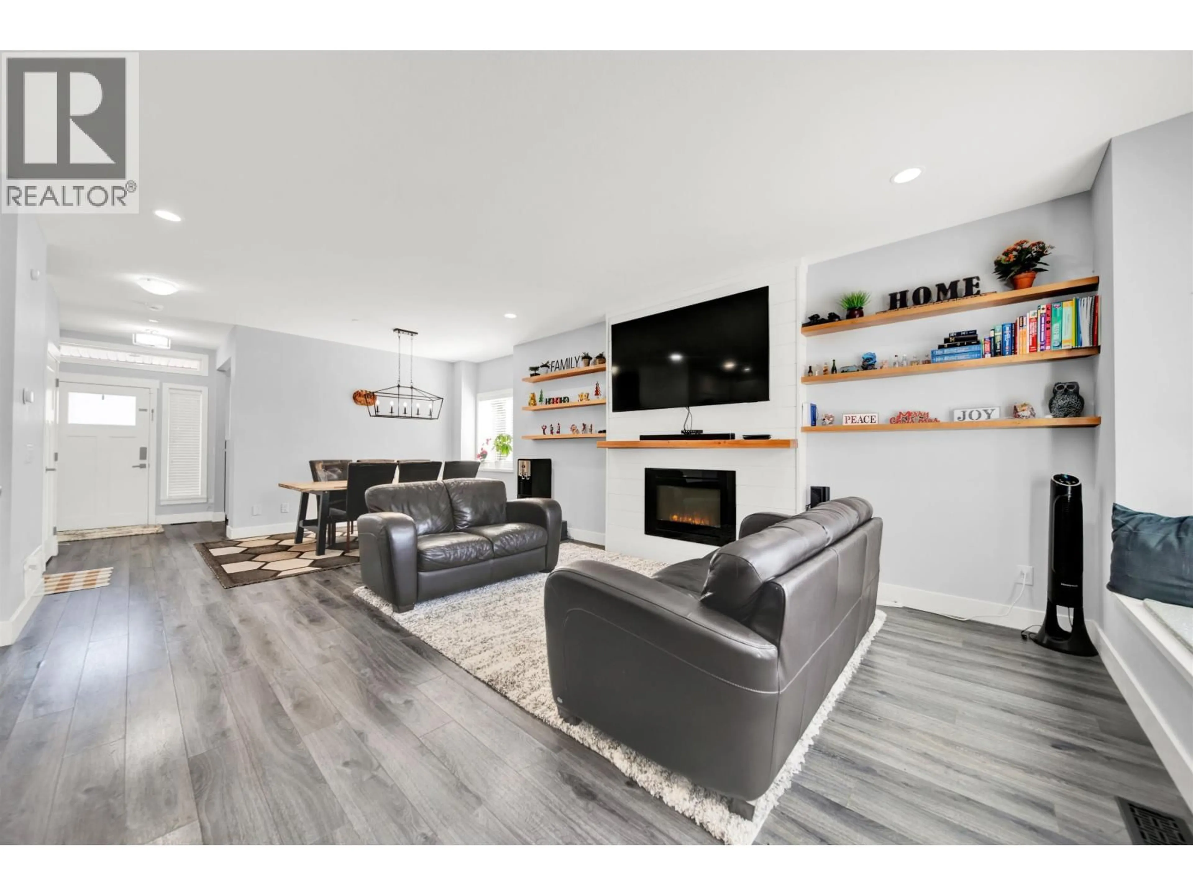 Living room with furniture, wood/laminate floor for 11155 240 STREET, Maple Ridge British Columbia V2W0H7