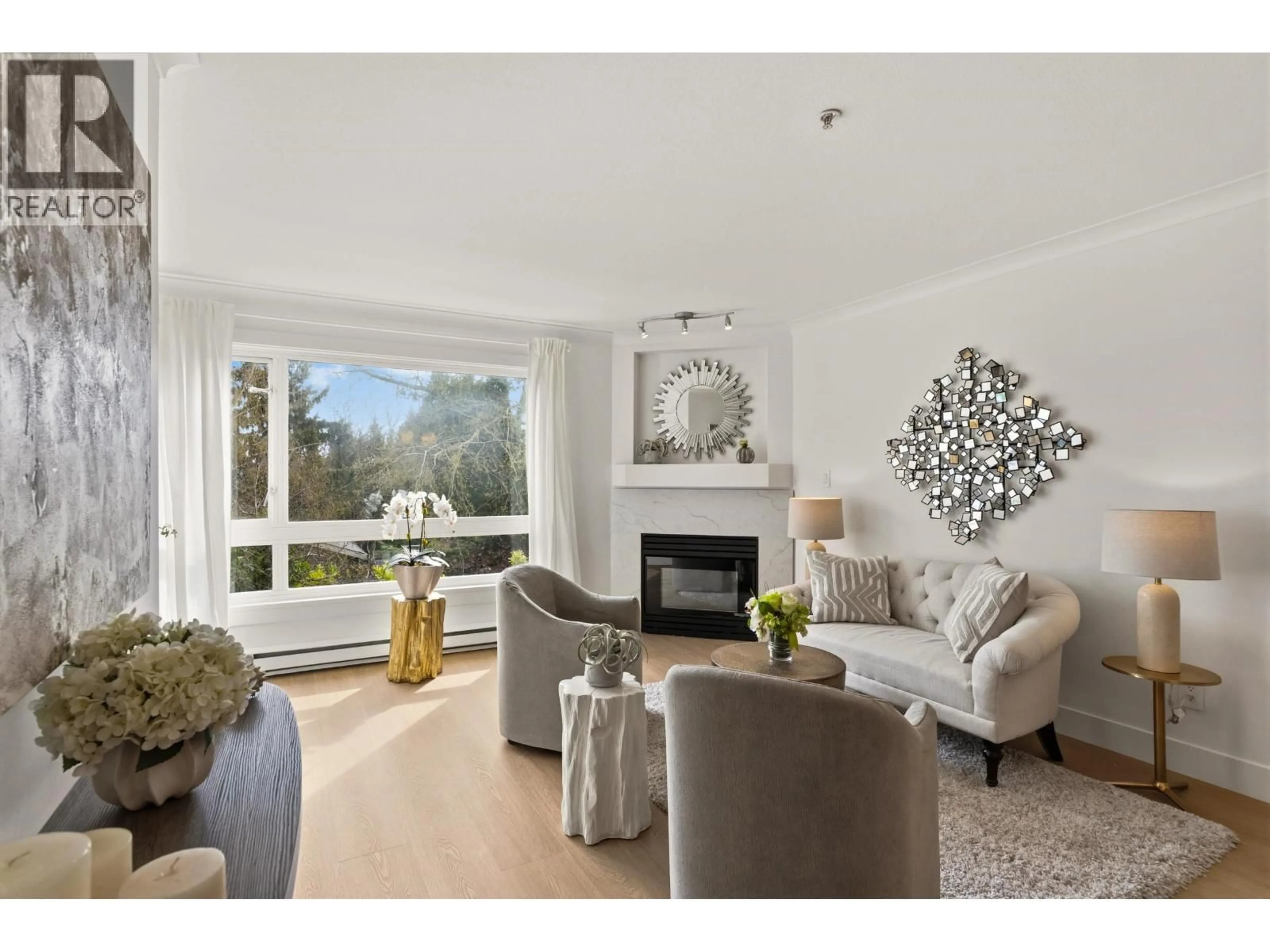 Living room with furniture, wood/laminate floor for 302 - 3590 26TH AVENUE, Vancouver British Columbia V6S1N9