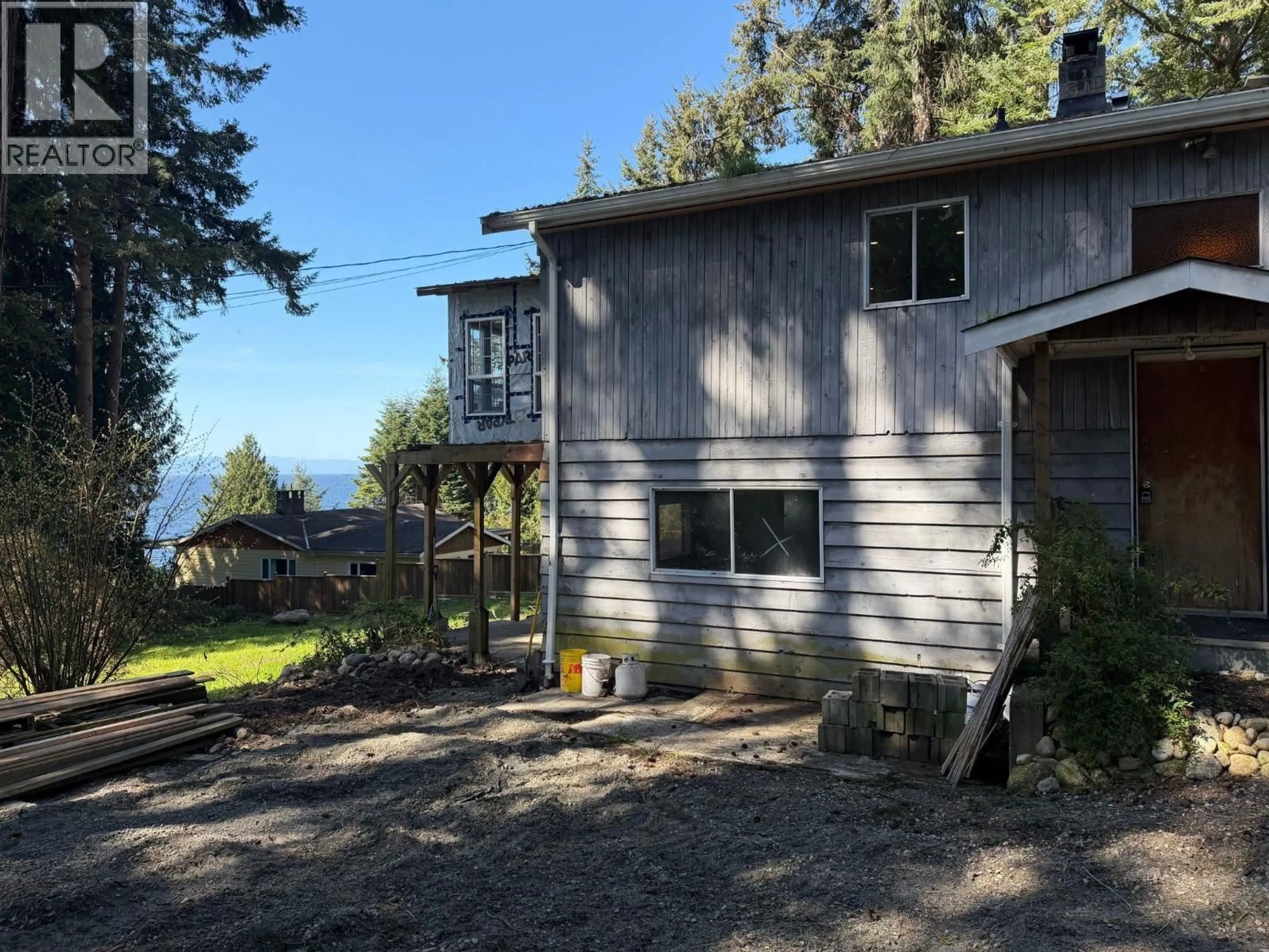 A pic from outside/outdoor area/front of a property/back of a property/a pic from drone, water/lake/river/ocean view for 2405 MILLINER ROAD, Roberts Creek British Columbia V0N2W6