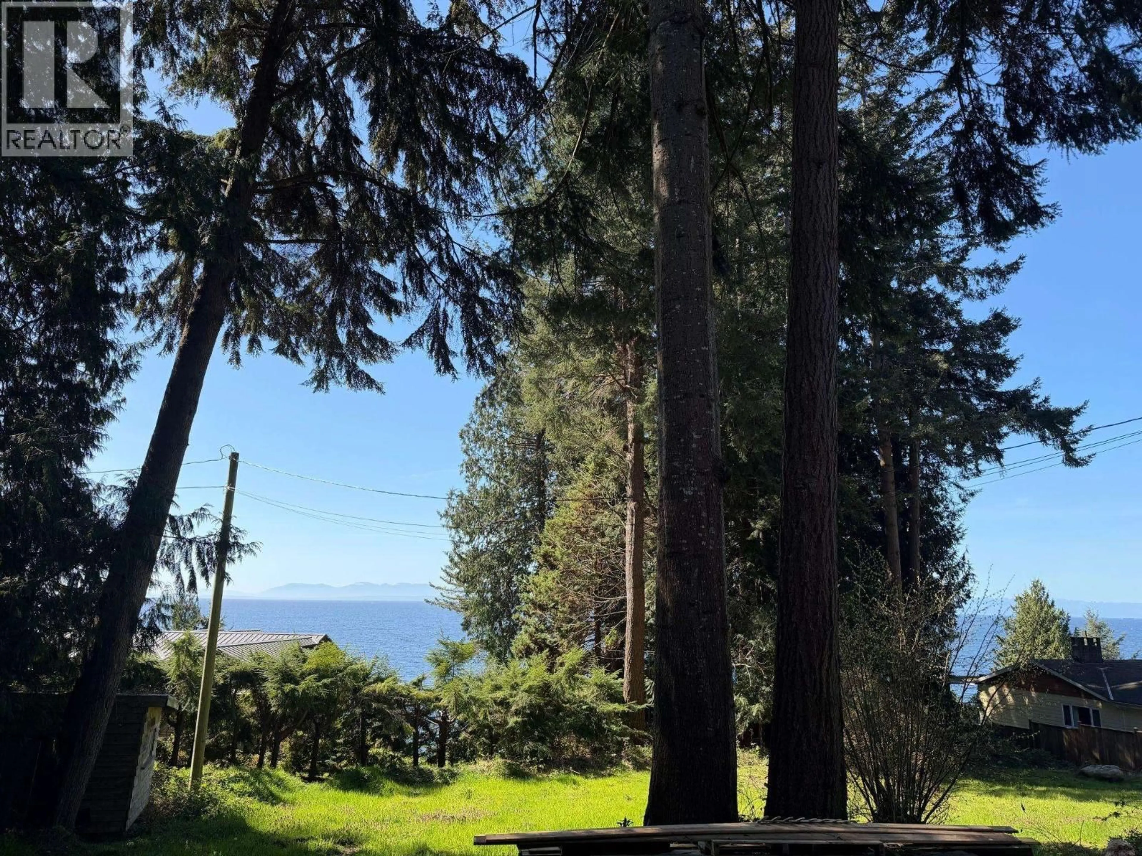 A pic from outside/outdoor area/front of a property/back of a property/a pic from drone, water/lake/river/ocean view for 2405 MILLINER ROAD, Roberts Creek British Columbia V0N2W6