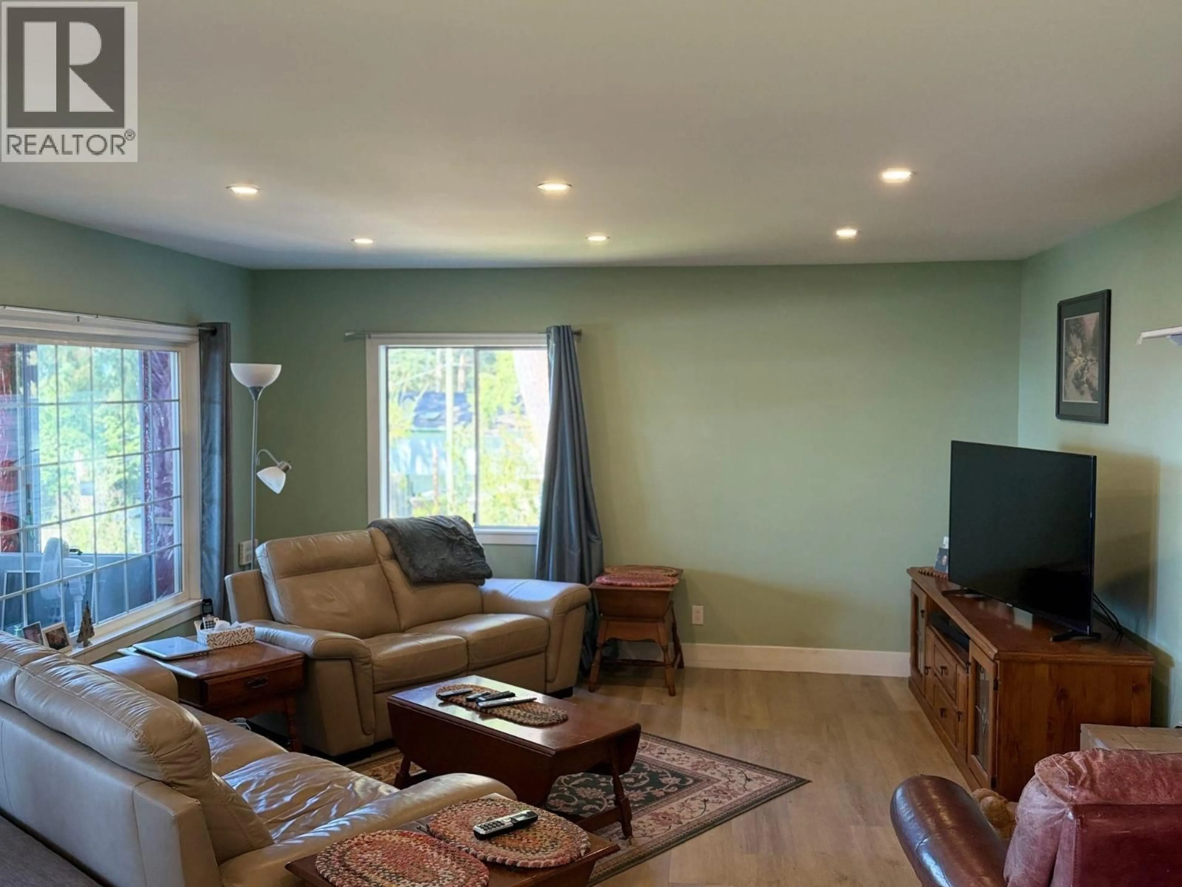 Living room with furniture, wood/laminate floor for 2405 MILLINER ROAD, Roberts Creek British Columbia V0N2W6