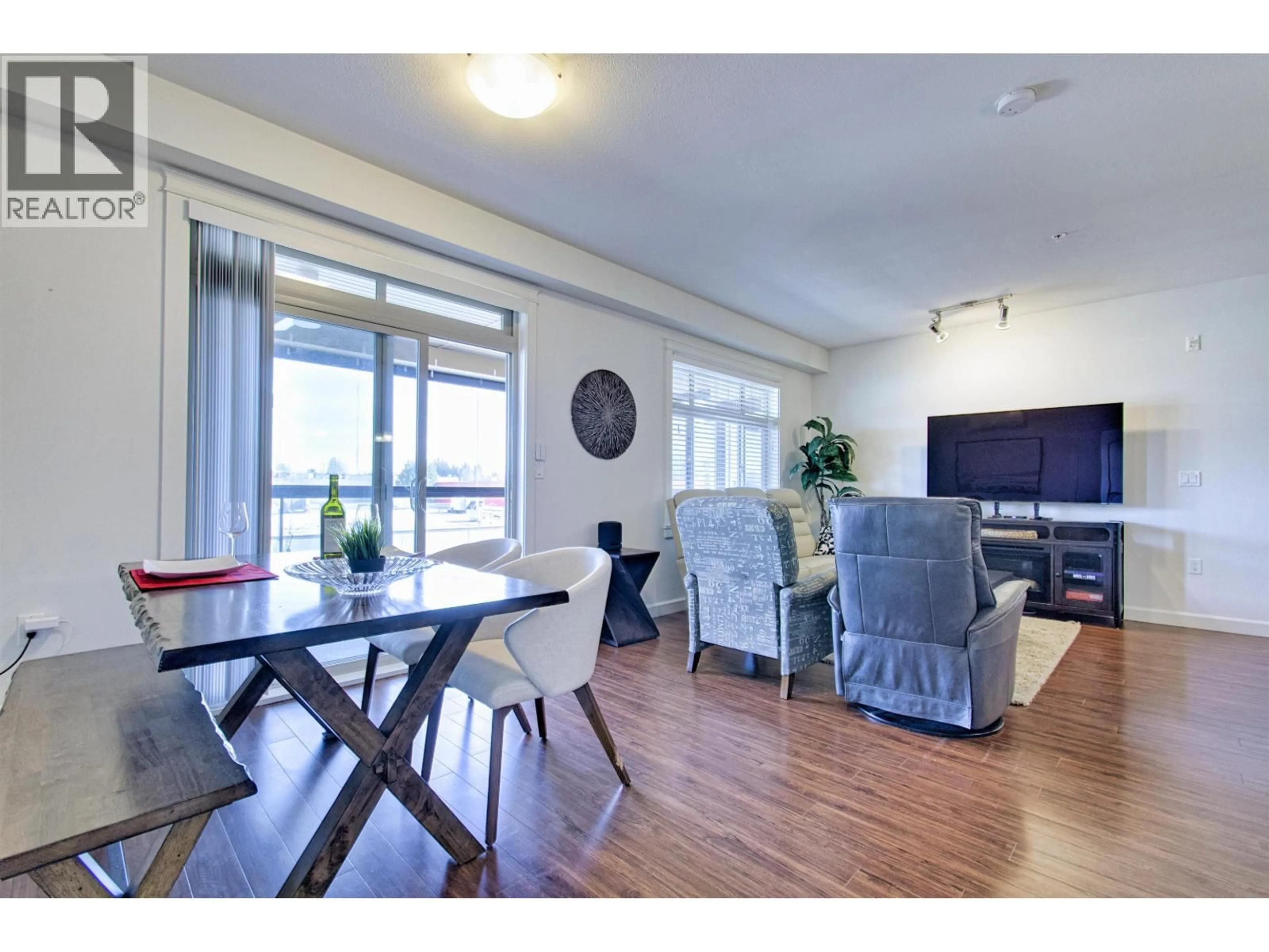 Living room with furniture, wood/laminate floor for 211 - 12655 190A STREET, Pitt Meadows British Columbia V3Y0E9