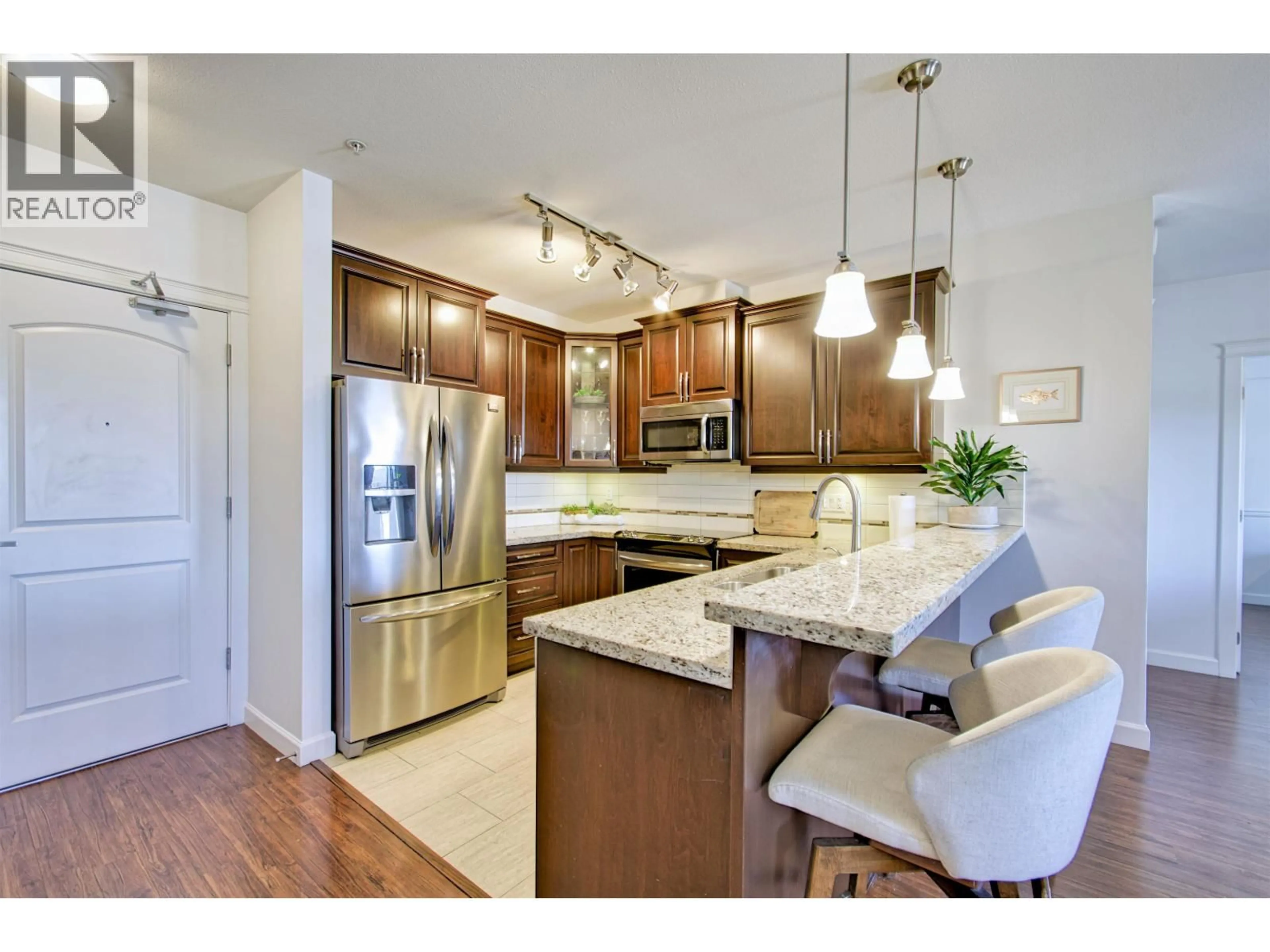 Open concept kitchen, unknown for 211 - 12655 190A STREET, Pitt Meadows British Columbia V3Y0E9