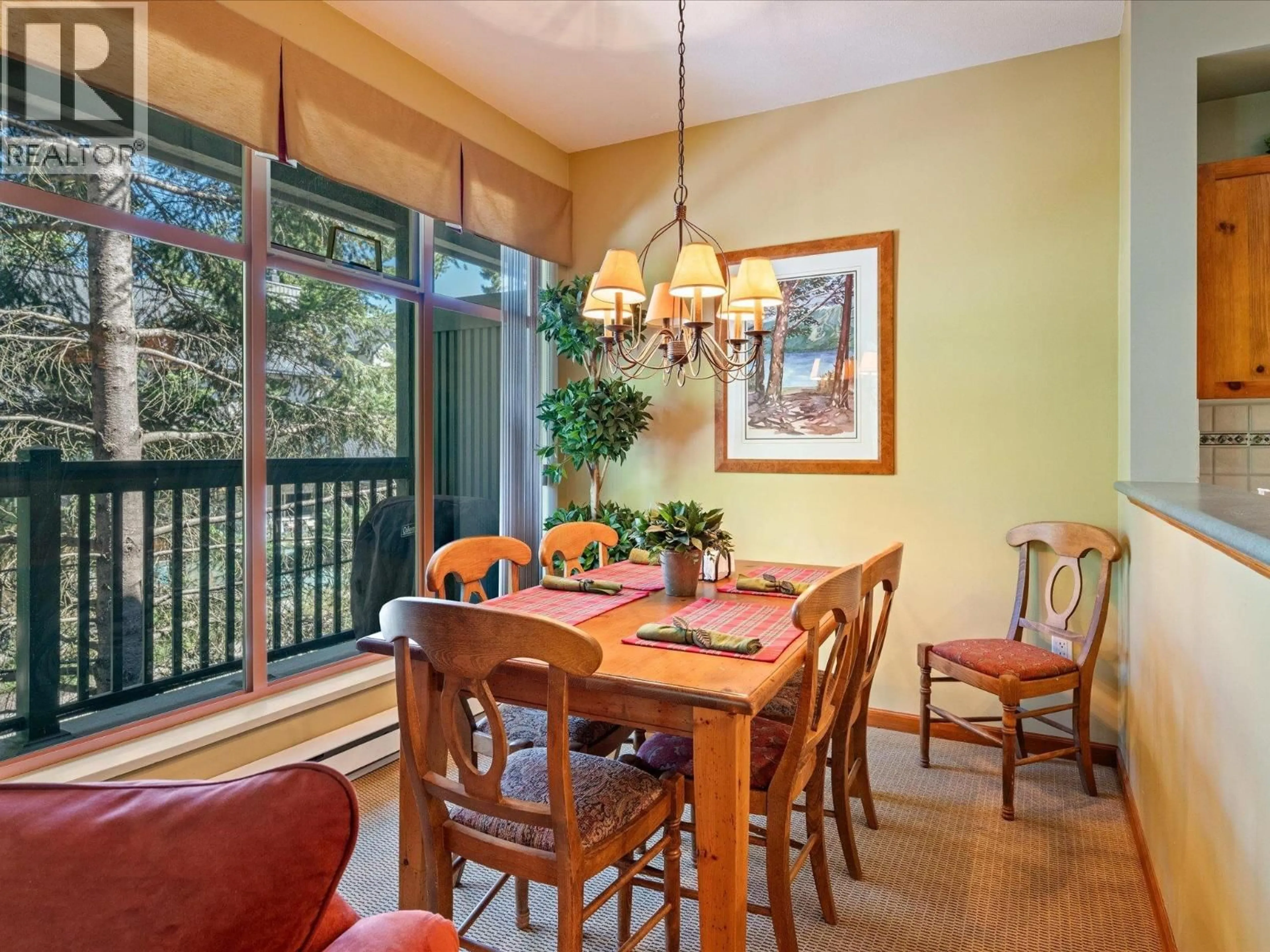 Dining room, wood/laminate floor for 117 - 4355 NORTHLANDS BOULEVARD, Whistler British Columbia V8E1C3