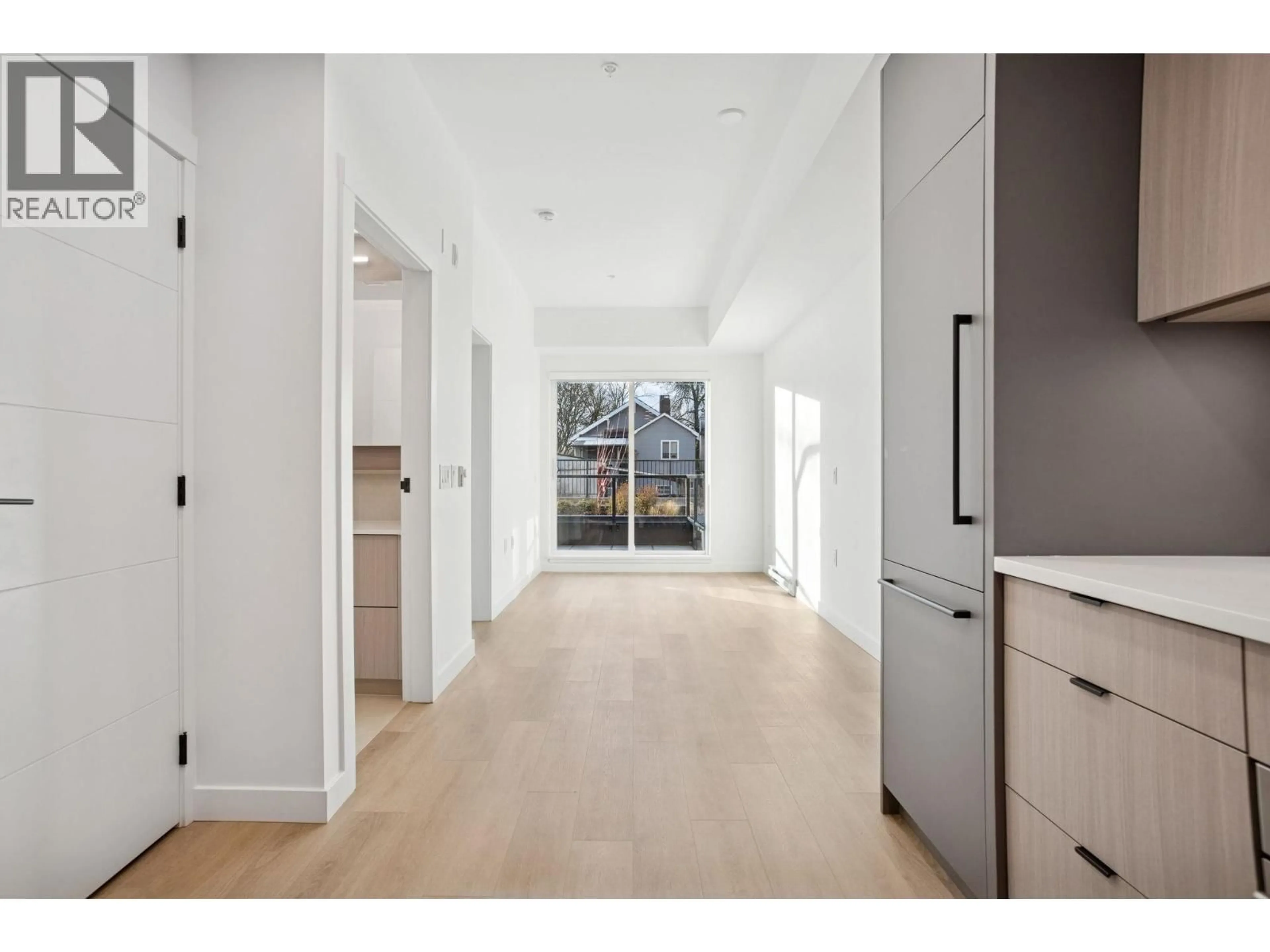 Indoor entryway for 104 - 2268 BROADWAY STREET, Vancouver British Columbia V5N0L2