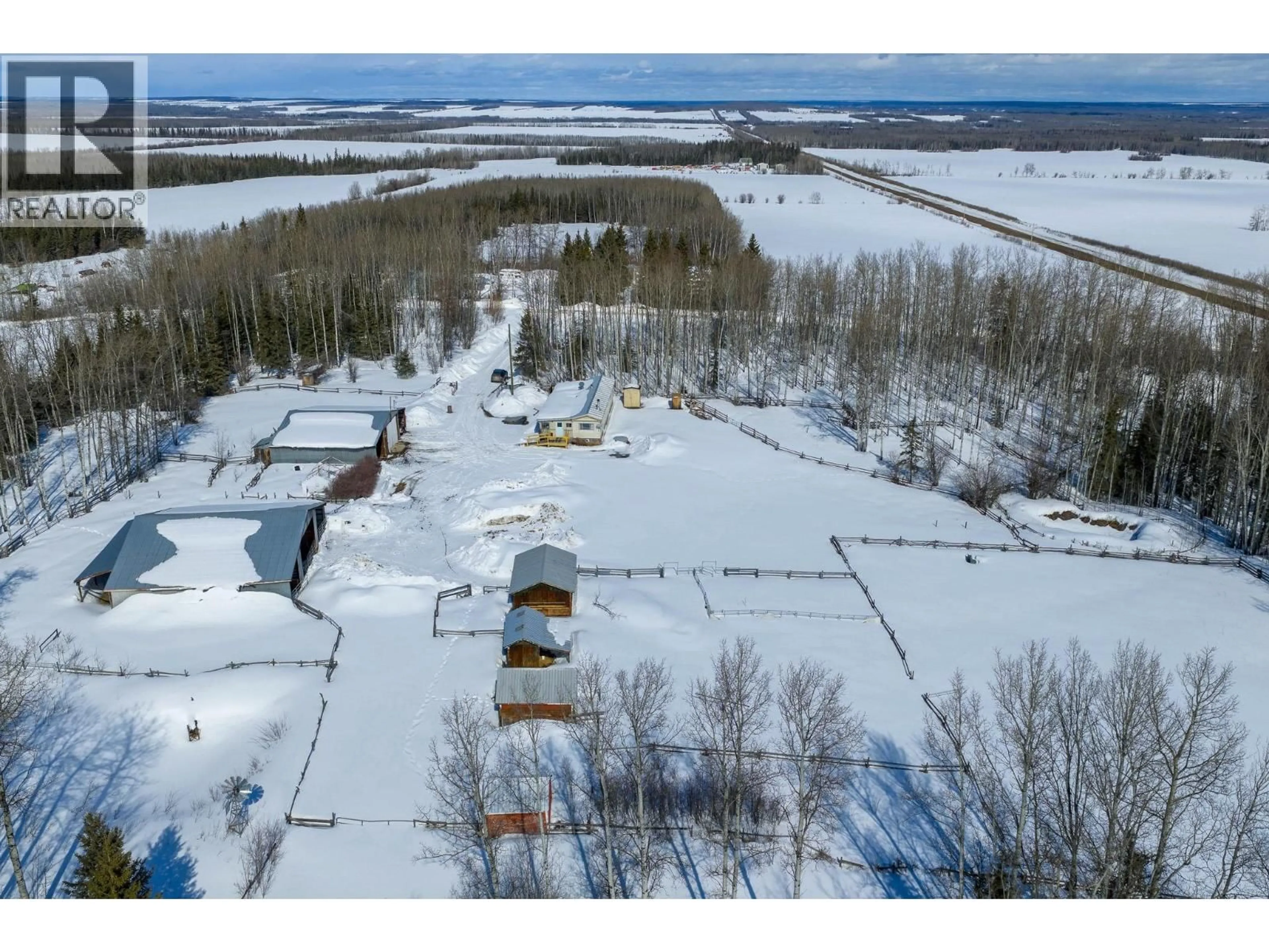 A pic from outside/outdoor area/front of a property/back of a property/a pic from drone, water/lake/river/ocean view for 8789 266 ROAD, Fort St. John British Columbia V0C1Y0