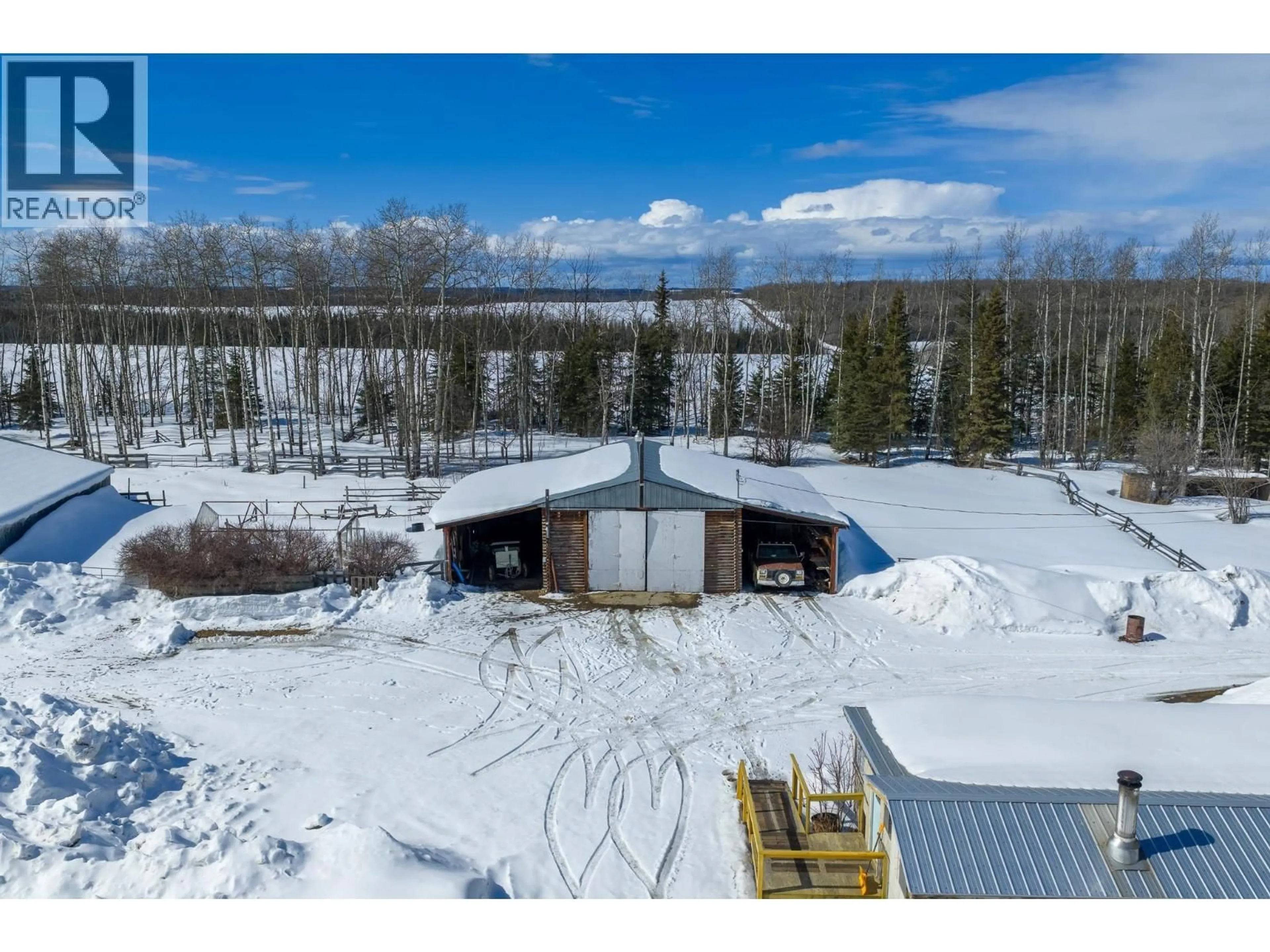A pic from outside/outdoor area/front of a property/back of a property/a pic from drone, unknown for 8789 266 ROAD, Fort St. John British Columbia V0C1Y0