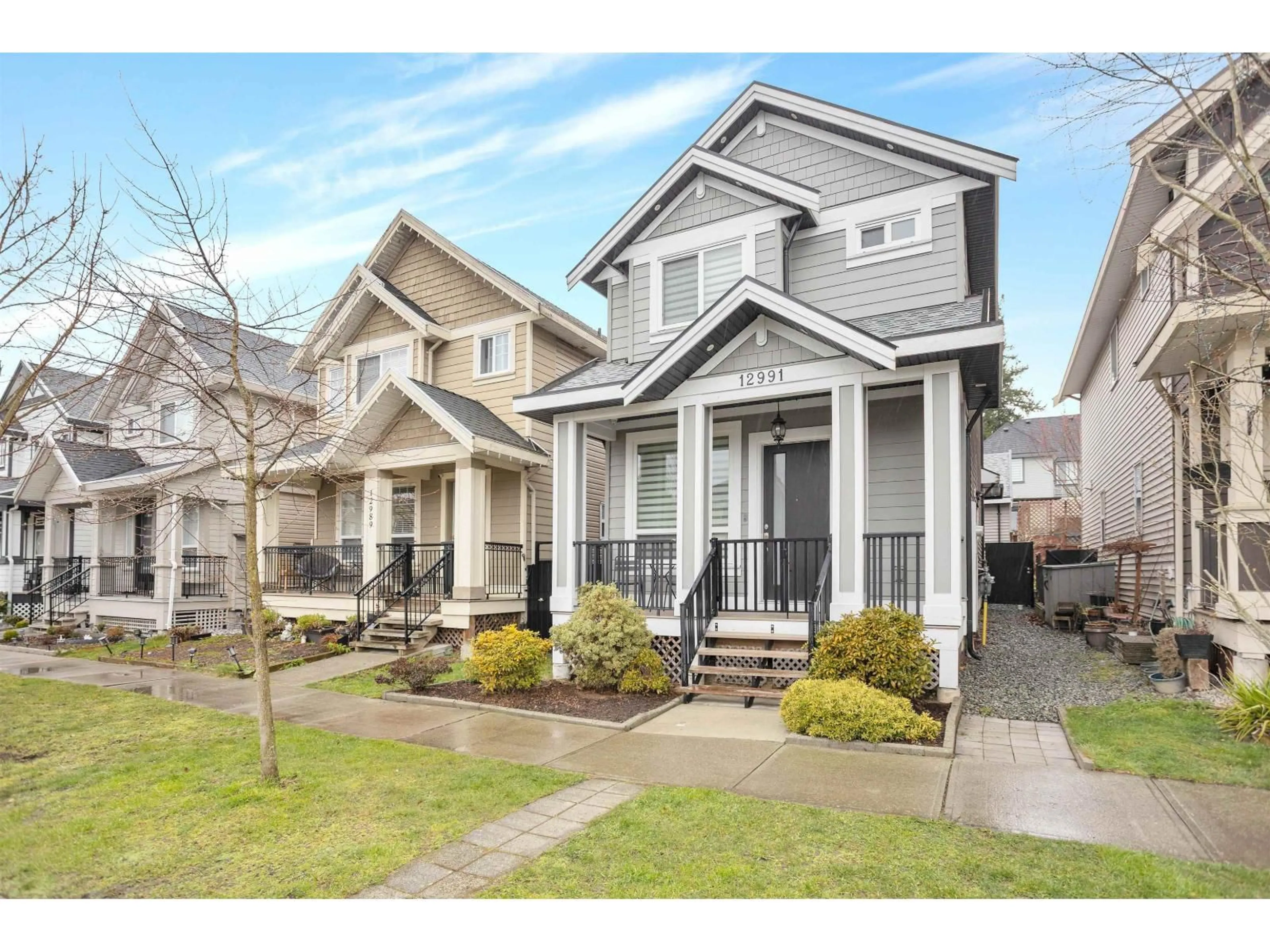 Home with vinyl exterior material, street for 12991 59 AVENUE, Surrey British Columbia V3X0C4