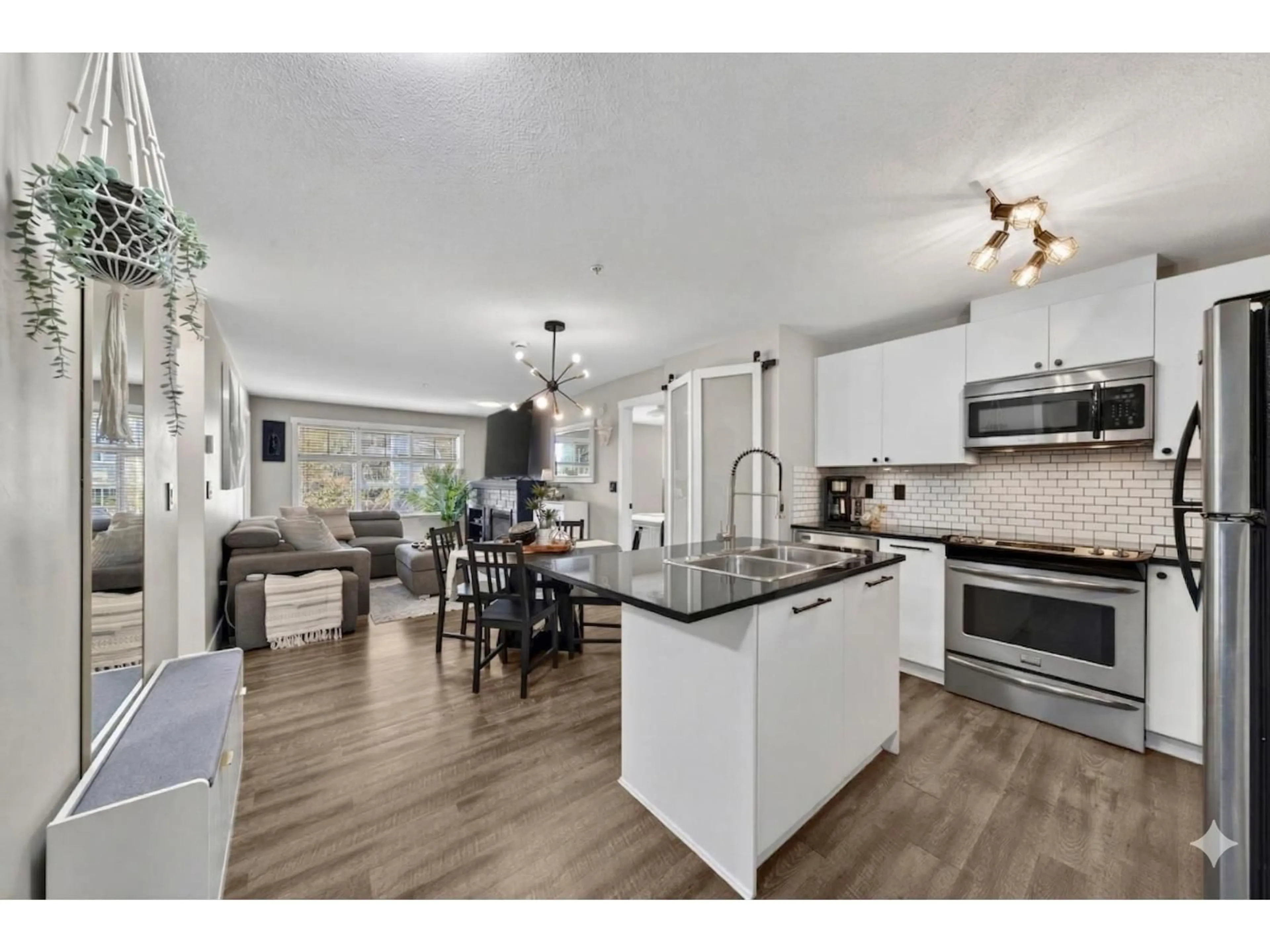 Open concept kitchen, unknown for 301 - 6500 194 STREET, Surrey British Columbia V4N5X4