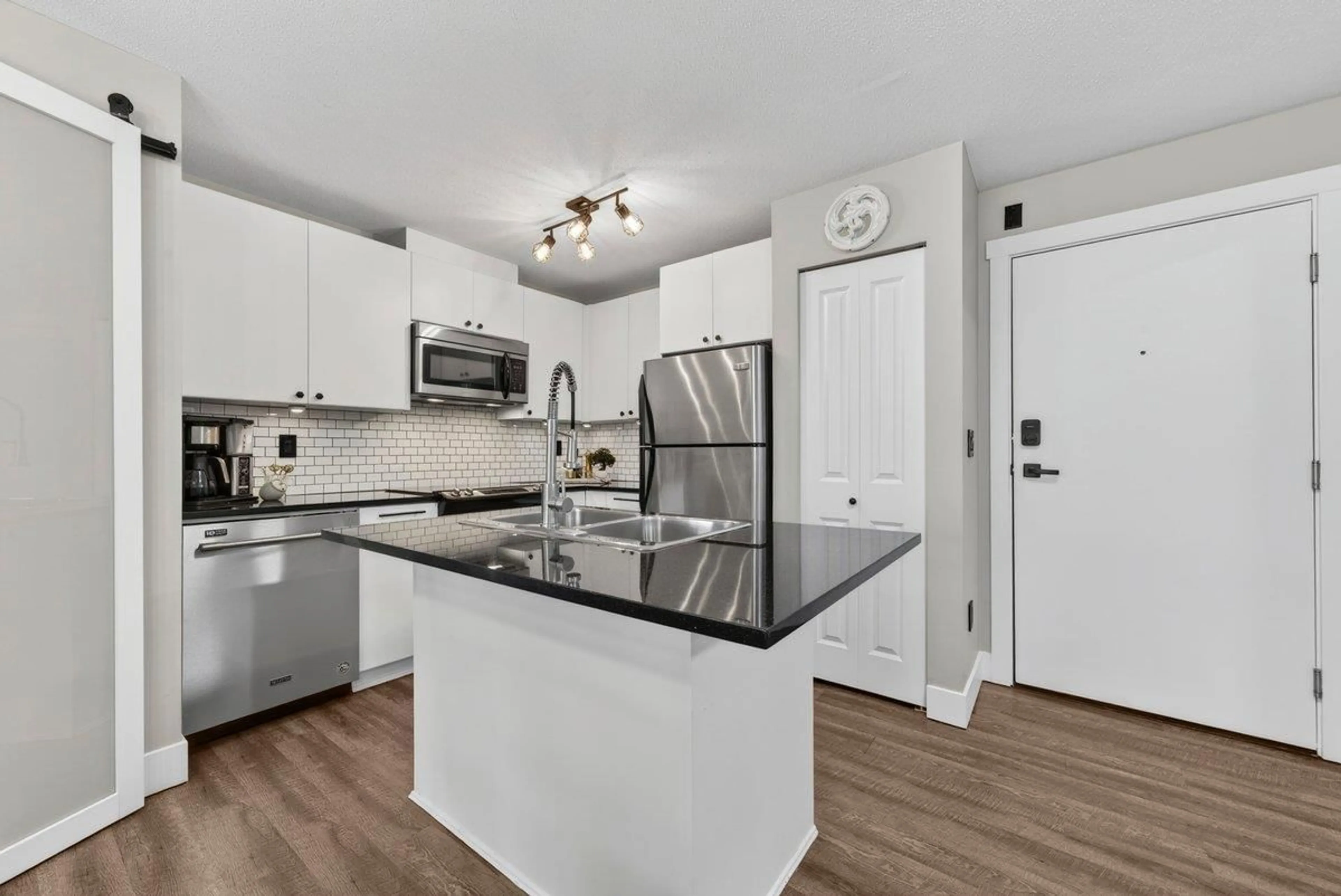 Open concept kitchen, unknown for 301 - 6500 194 STREET, Surrey British Columbia V4N5X4