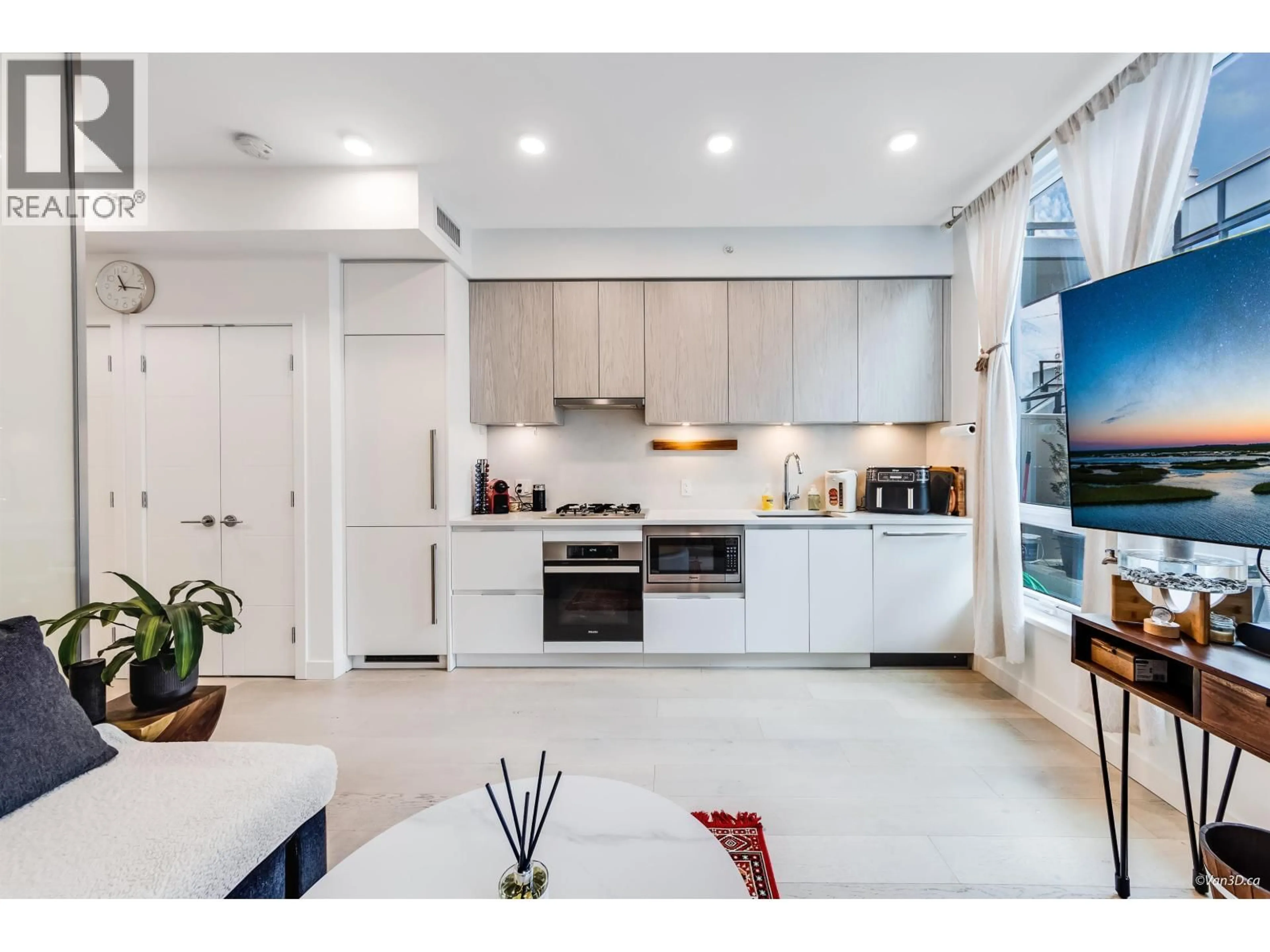 Open concept kitchen, ceramic/tile floor for 102 - 4240 CAMBIE STREET, Vancouver British Columbia V5Z0K6