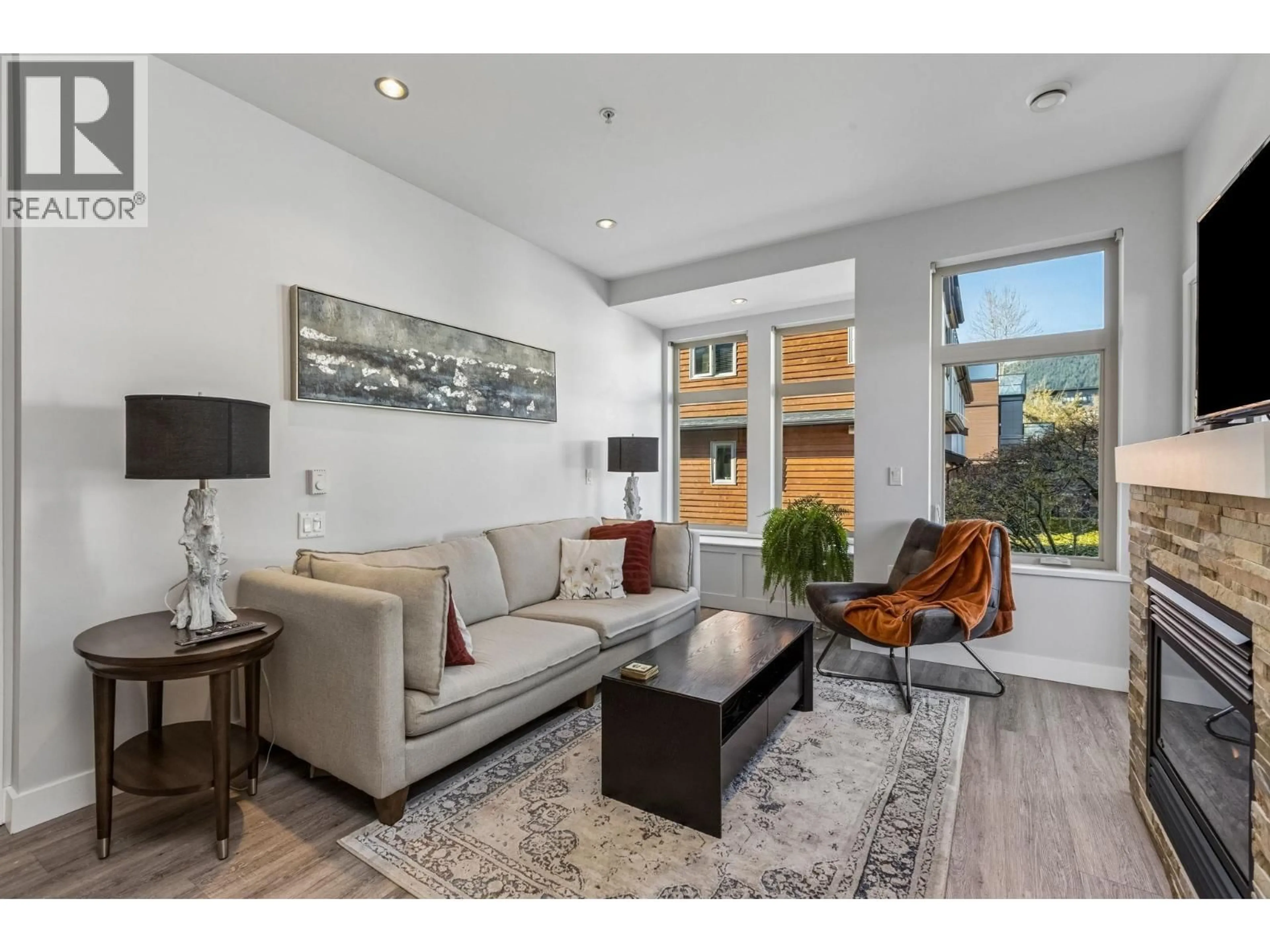 Living room with furniture, unknown for 207 - 116 23RD STREET, North Vancouver British Columbia V7M2A9